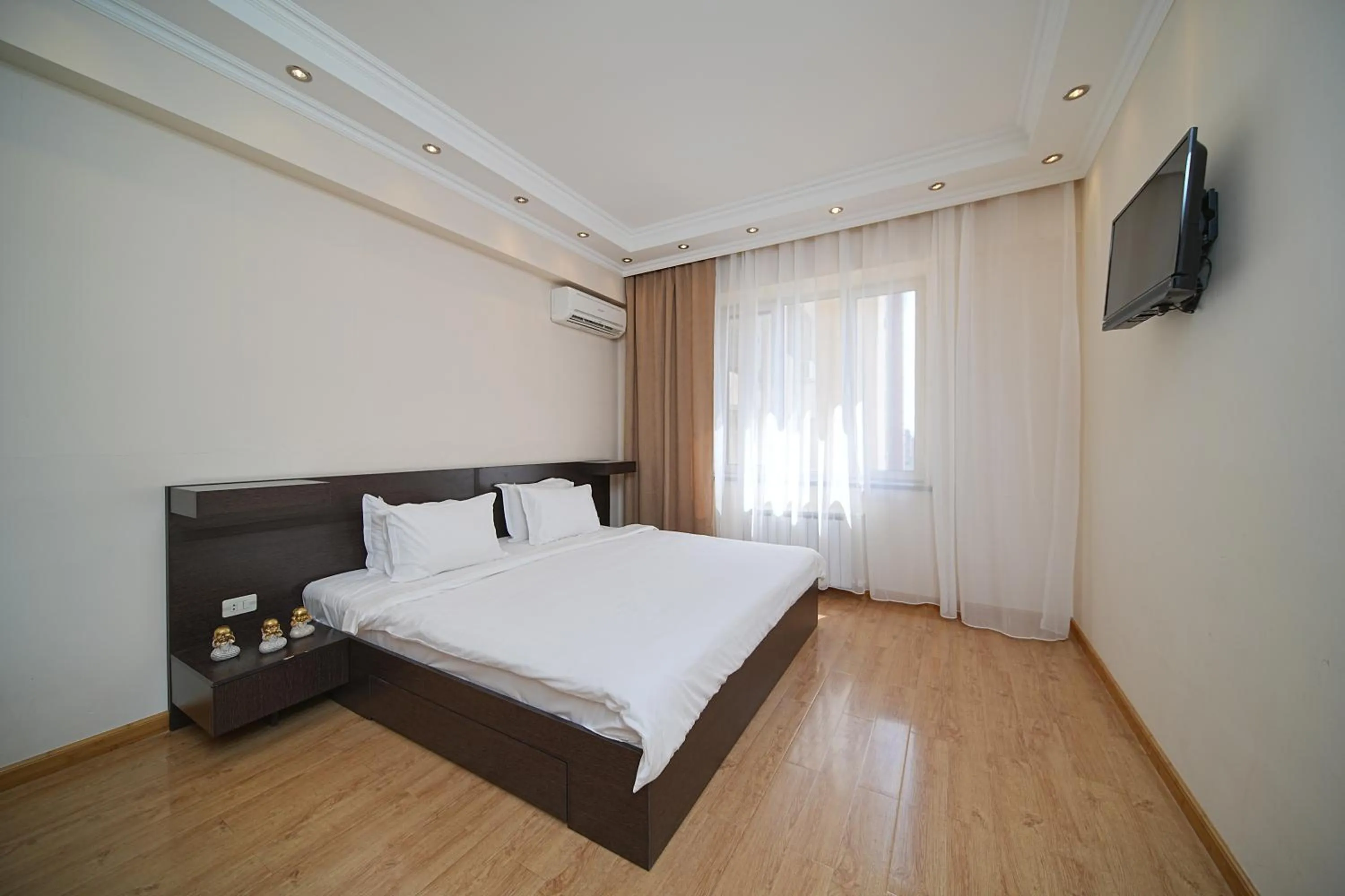 Bed in Sweet Home Apart-Hotel