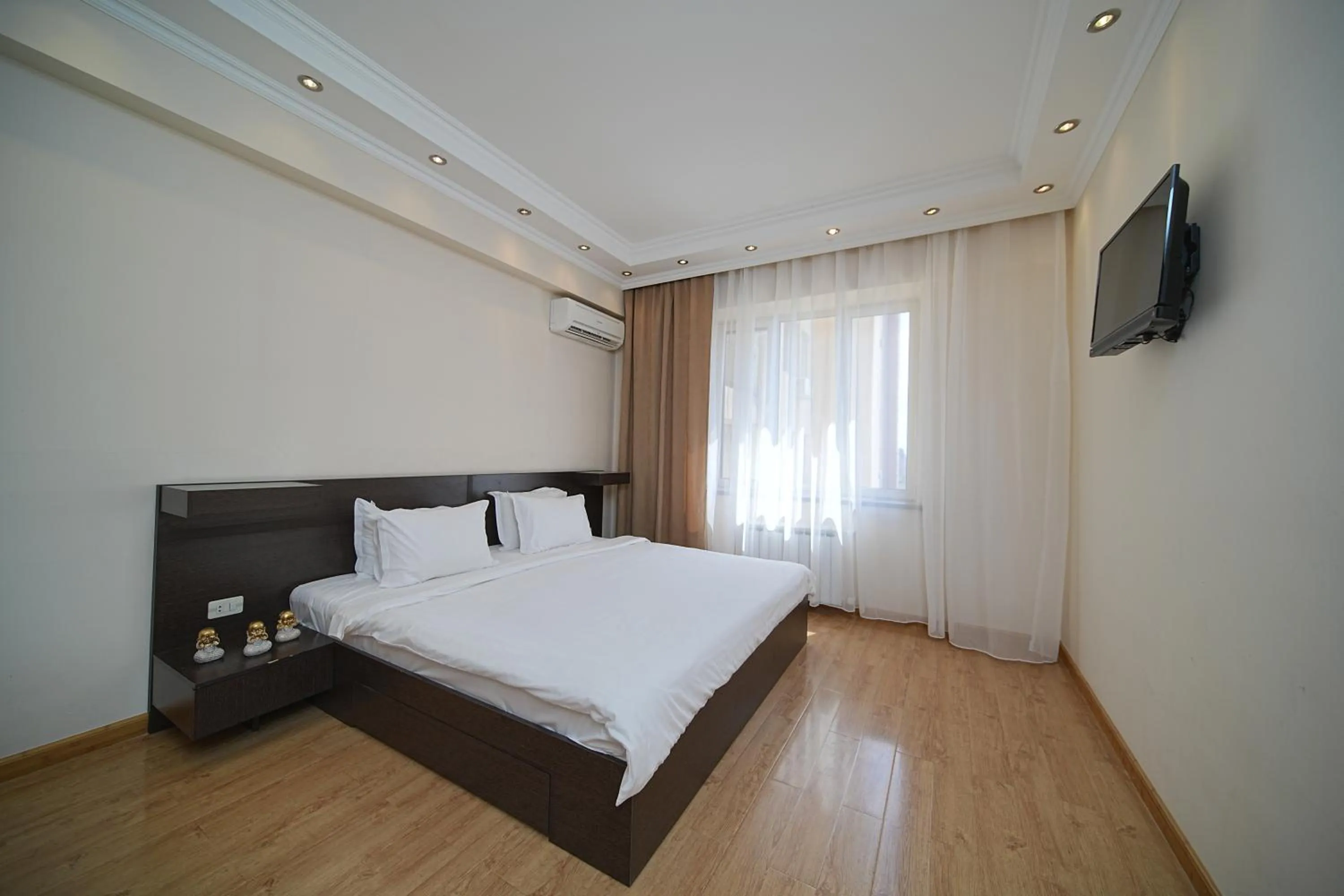 Bed in Sweet Home Apart-Hotel