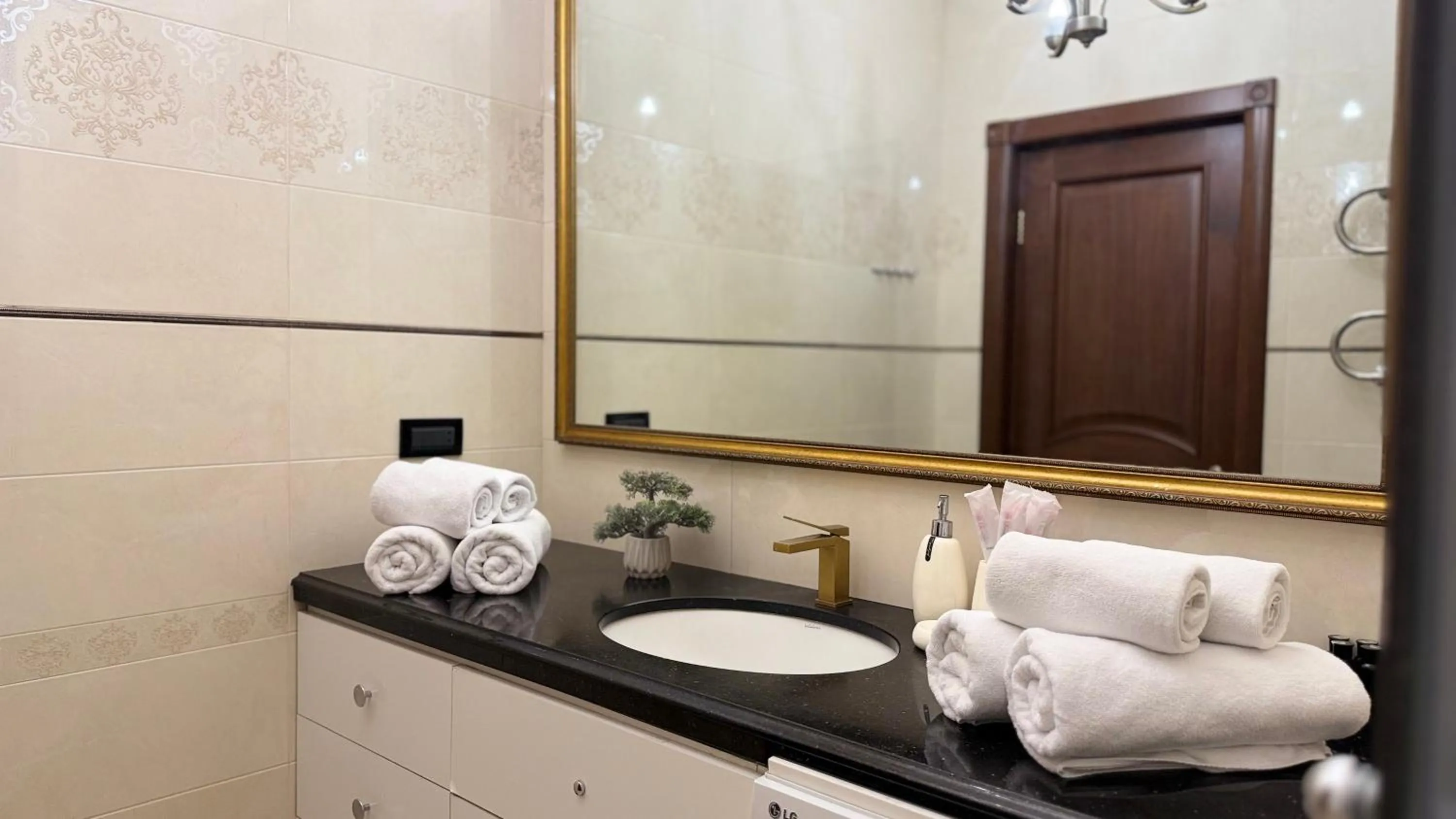 Bathroom in Sweet Home Apart-Hotel