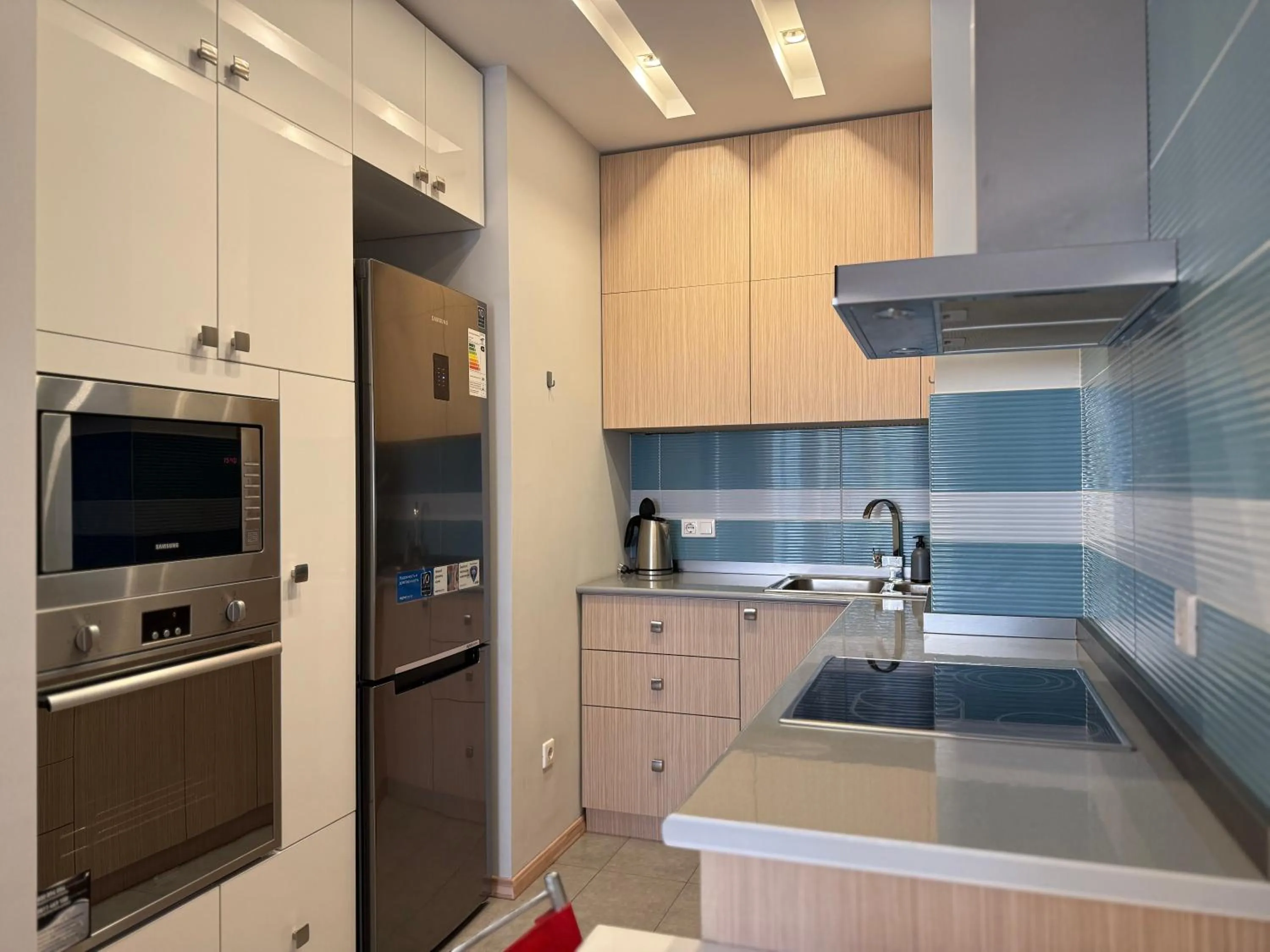 Kitchen or kitchenette in Sweet Home Apart-Hotel