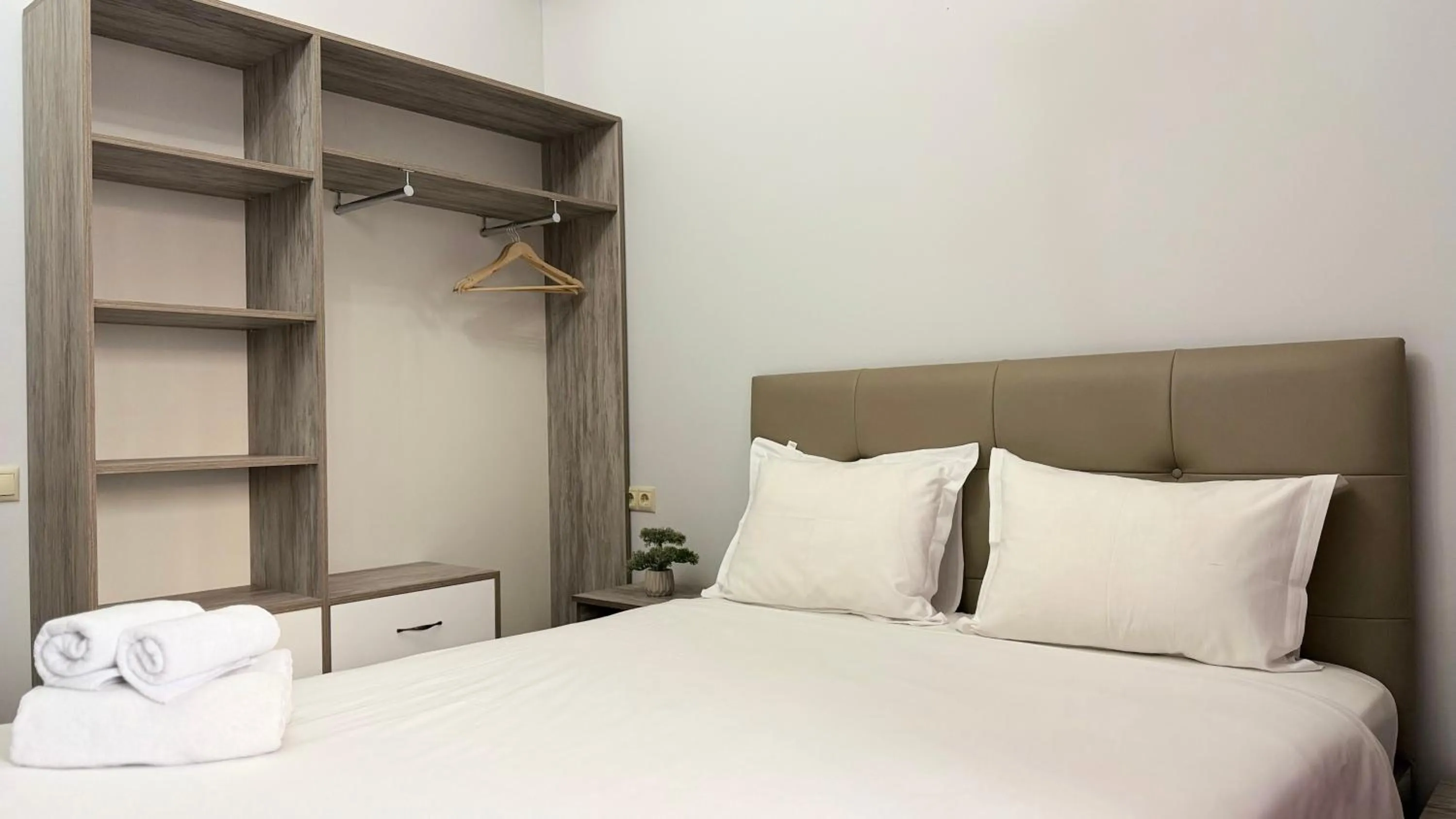 Bed in Sweet Home Apart-Hotel