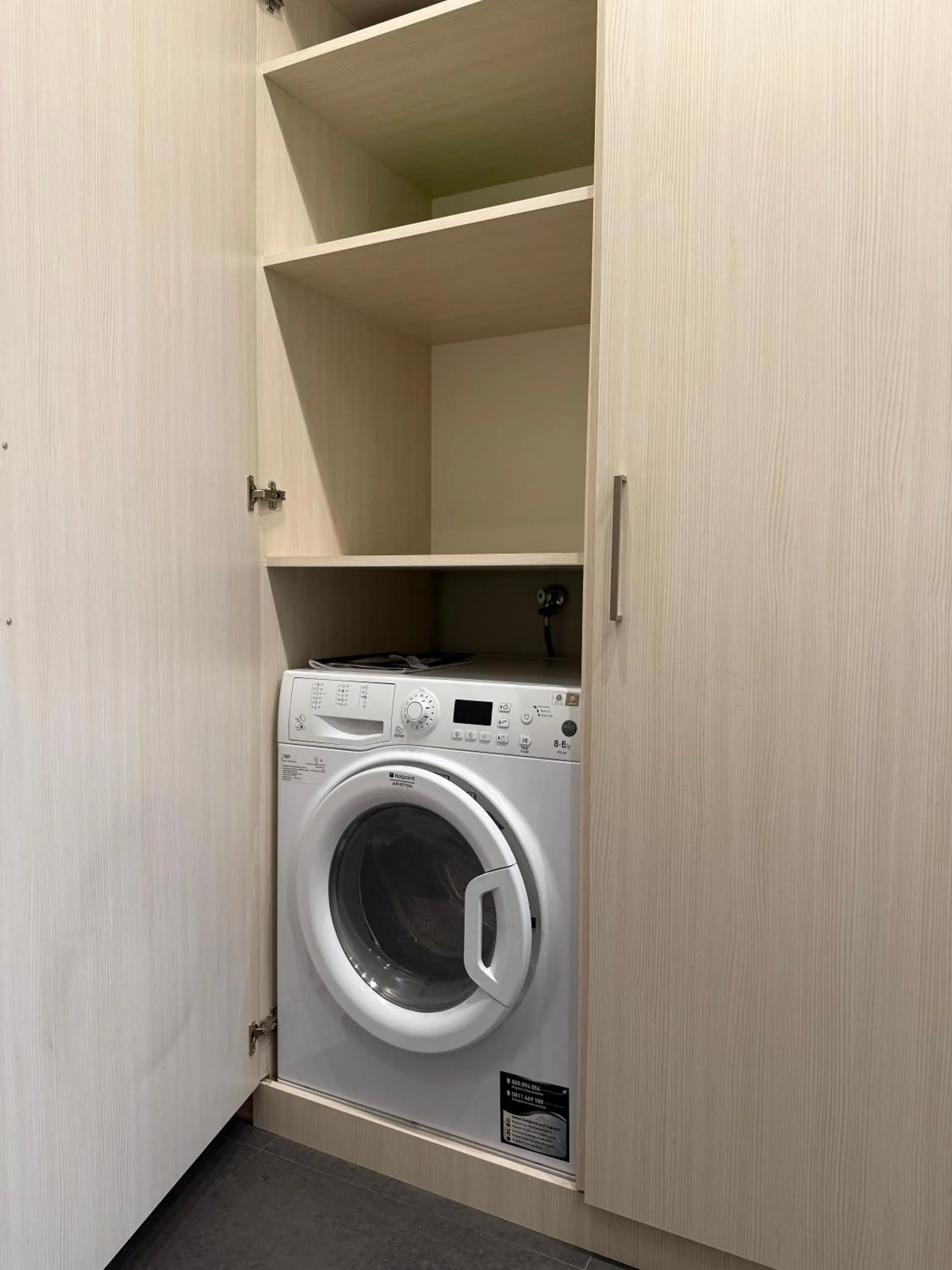washing machine in Sweet Home Apart-Hotel