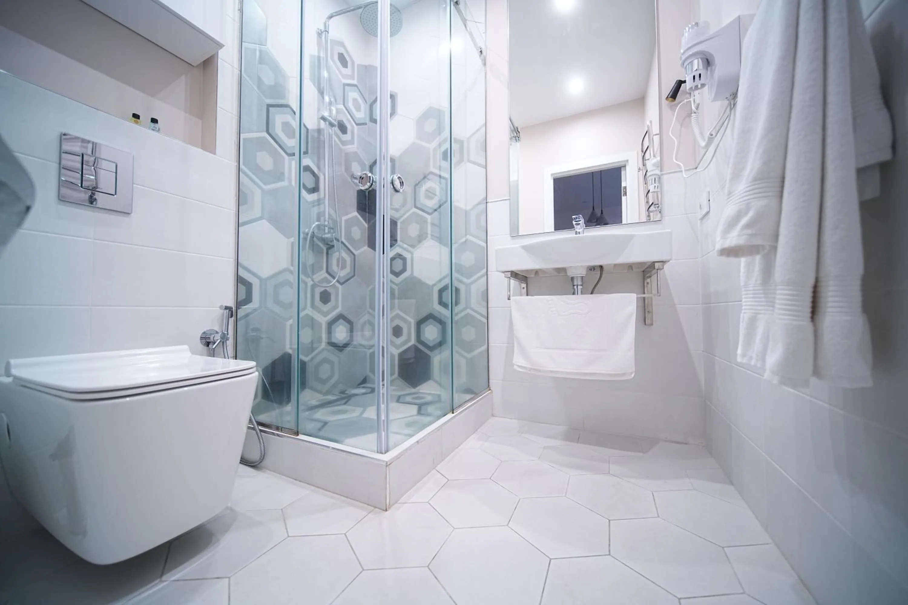 Shower in Sweet Home Apart-Hotel