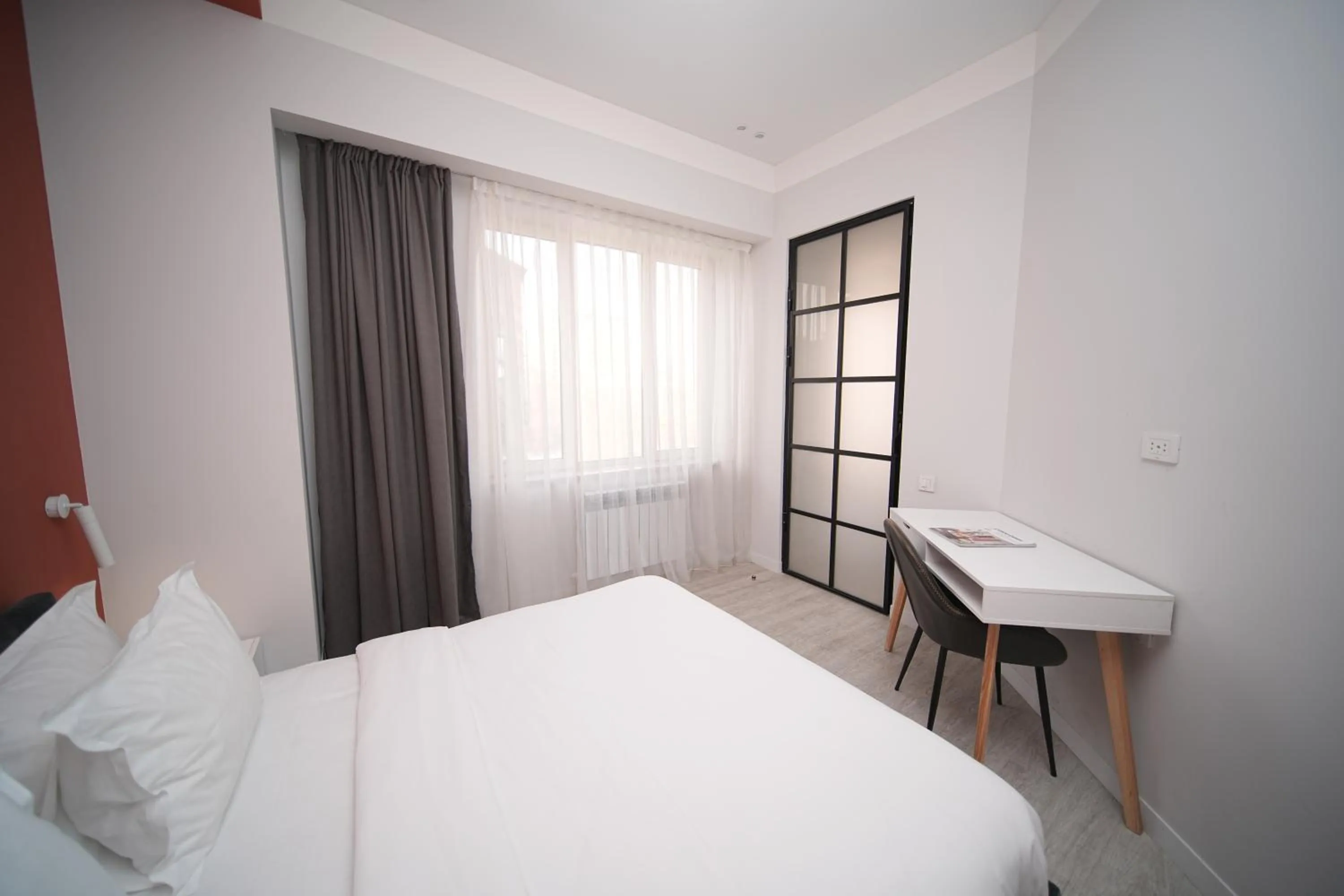 Bed in Sweet Home Apart-Hotel