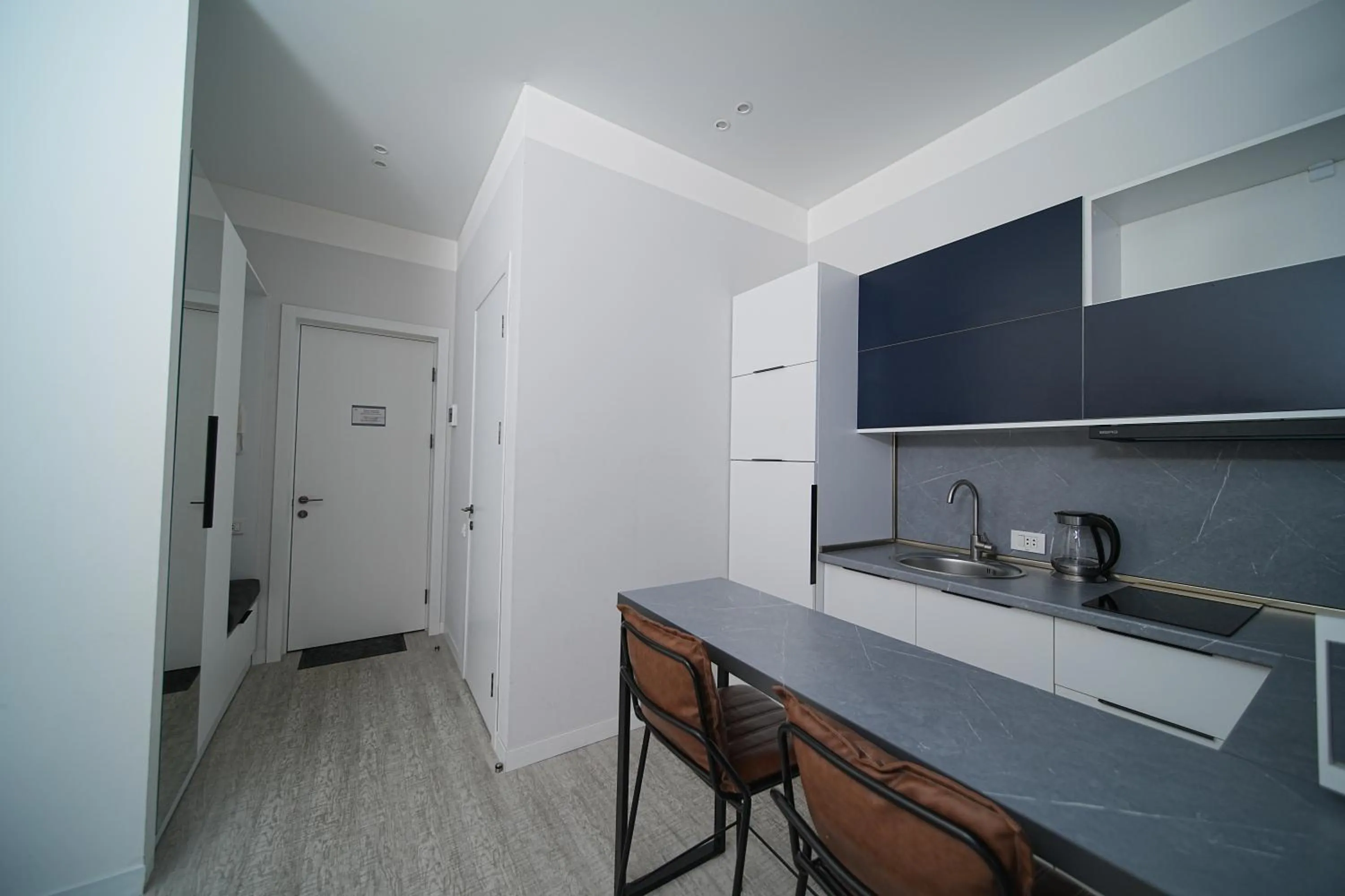 Kitchen or kitchenette in Sweet Home Apart-Hotel