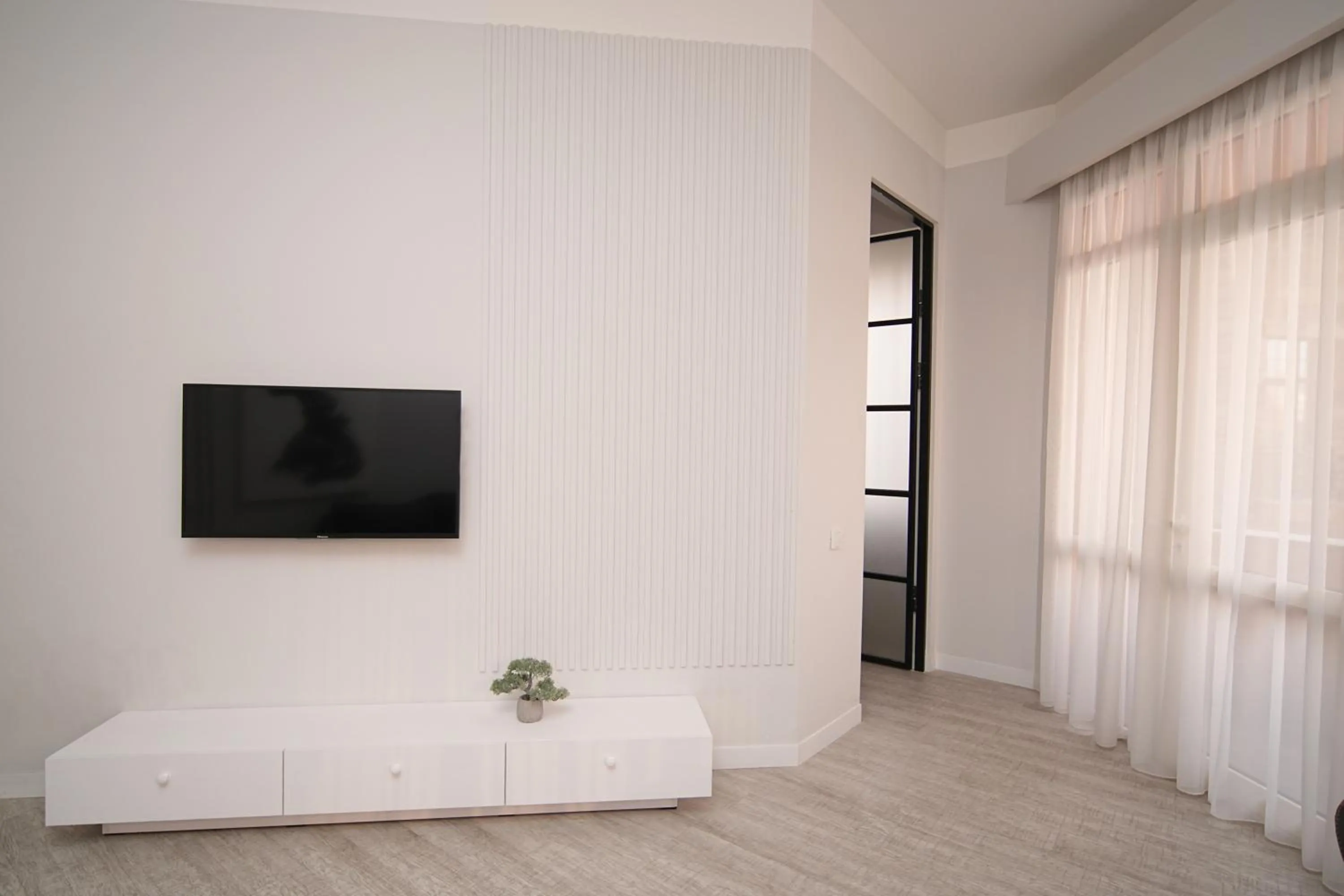 TV and multimedia, Bed in Sweet Home Apart-Hotel