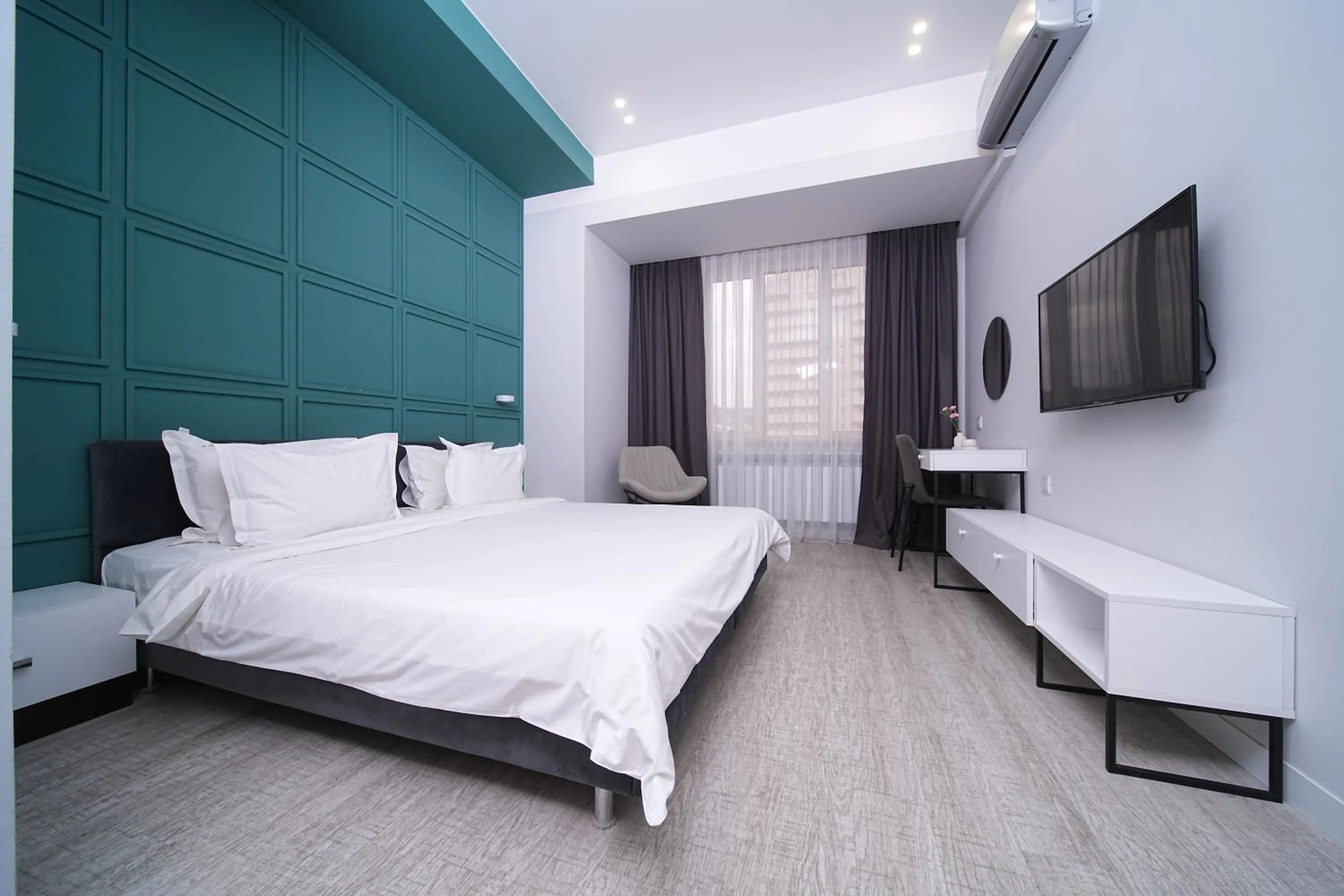 Bed in Sweet Home Apart-Hotel