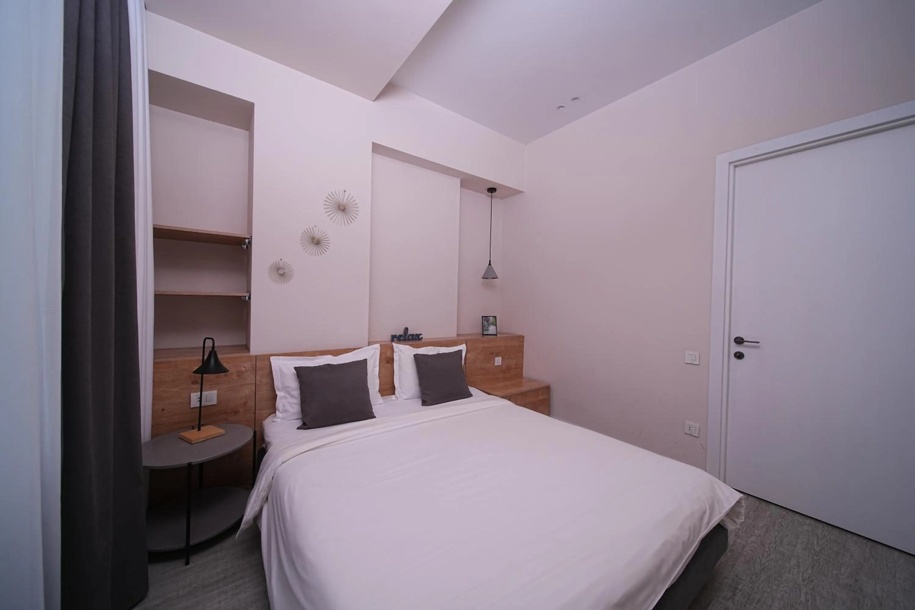 Bed in Sweet Home Apart-Hotel