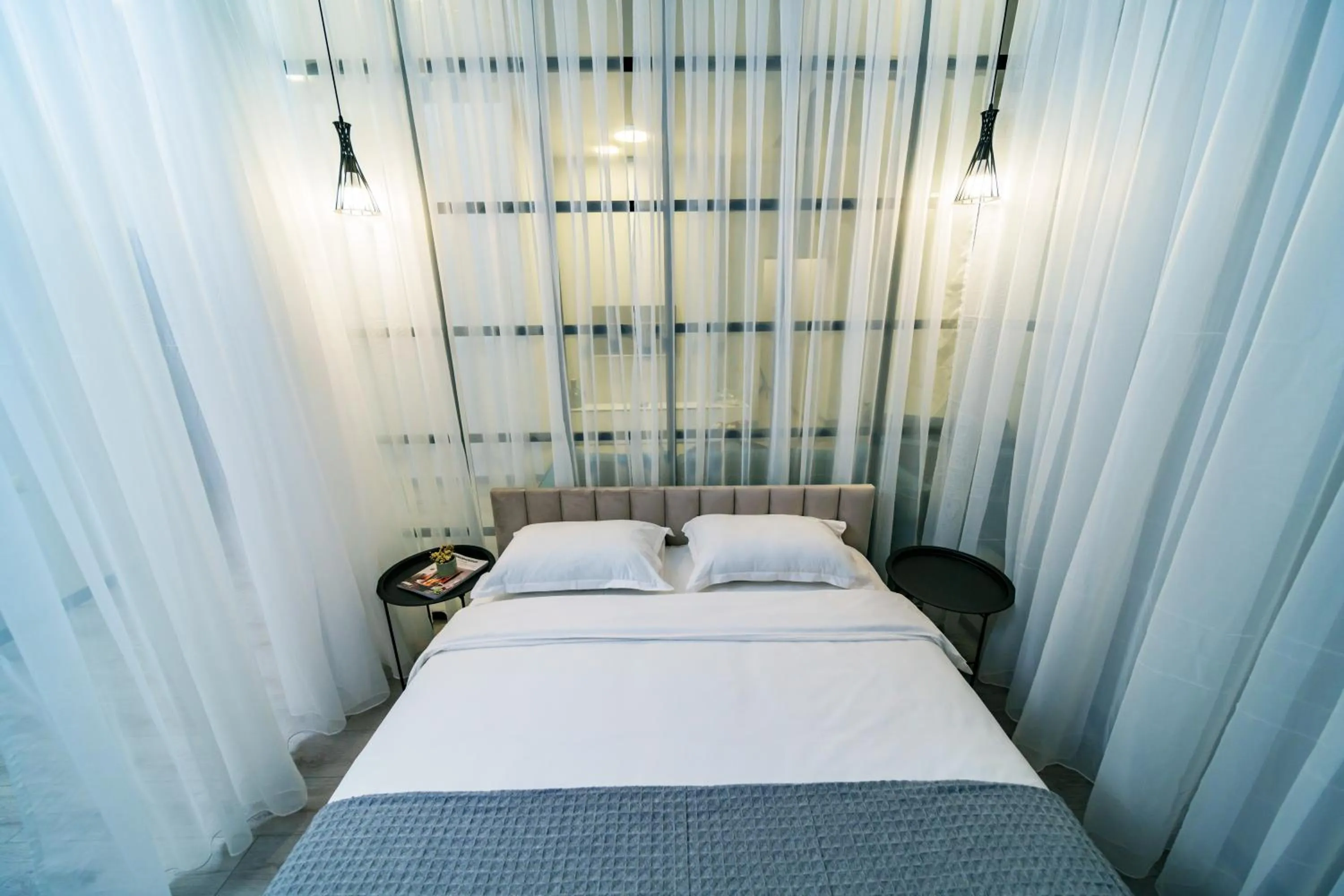 Bed in Sweet Home Apart-Hotel