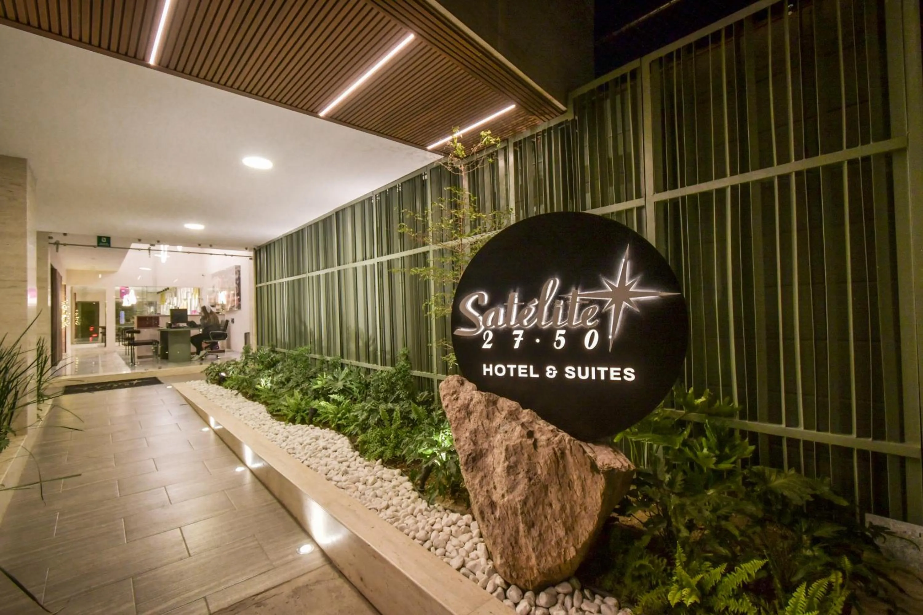 Lobby or reception in Expo Satelite 2750 Hotel & Suites