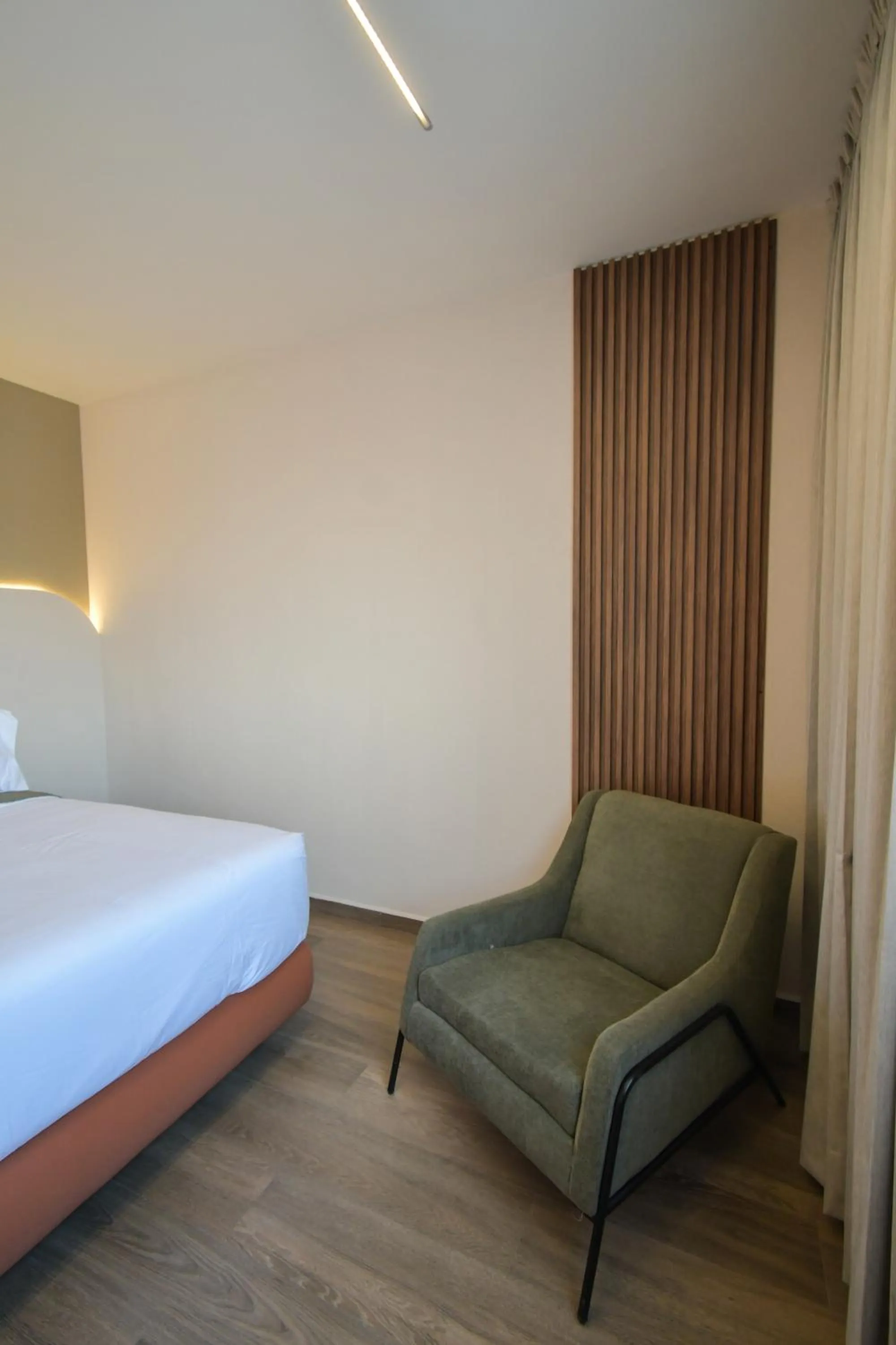 Bed in Expo Satelite 2750 Hotel & Suites