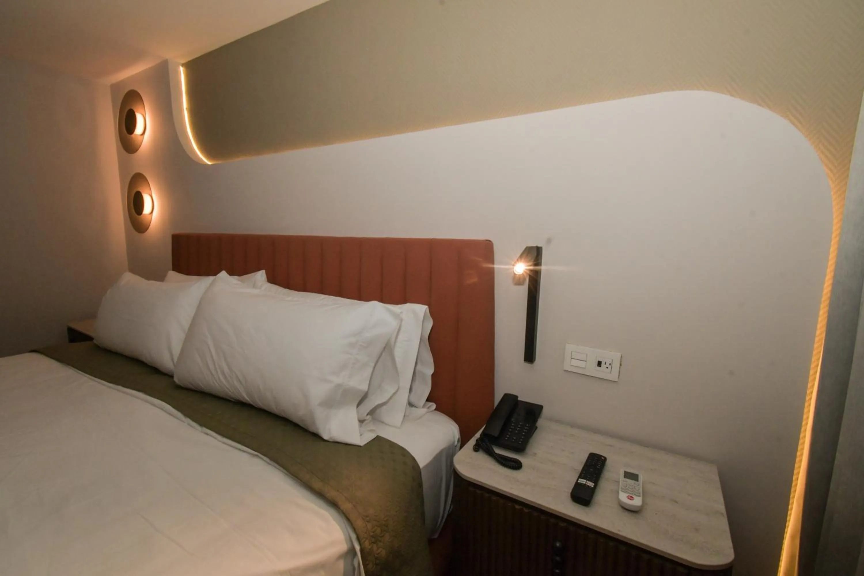 Bed in Expo Satelite 2750 Hotel & Suites