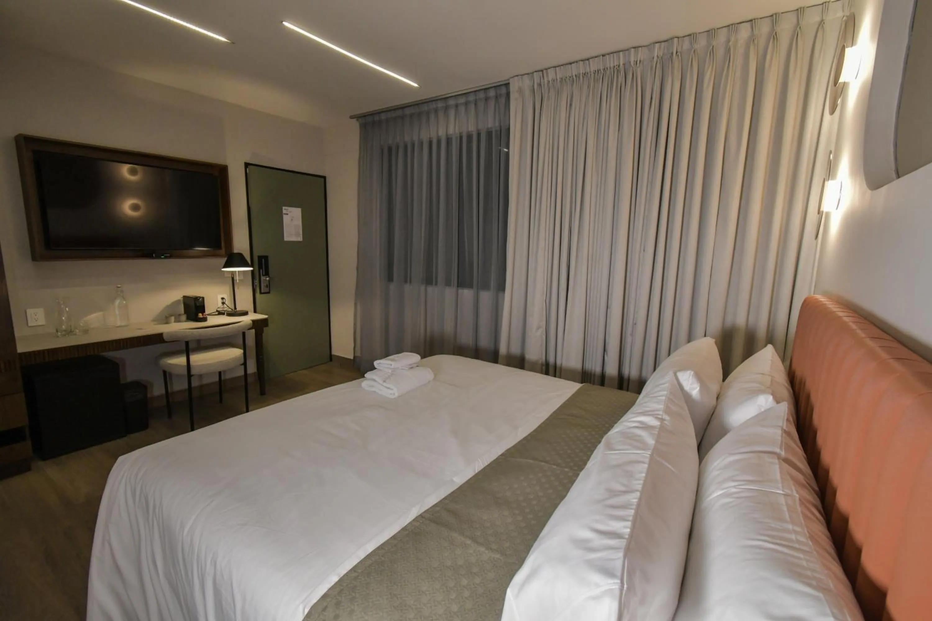 Bed in Expo Satelite 2750 Hotel & Suites