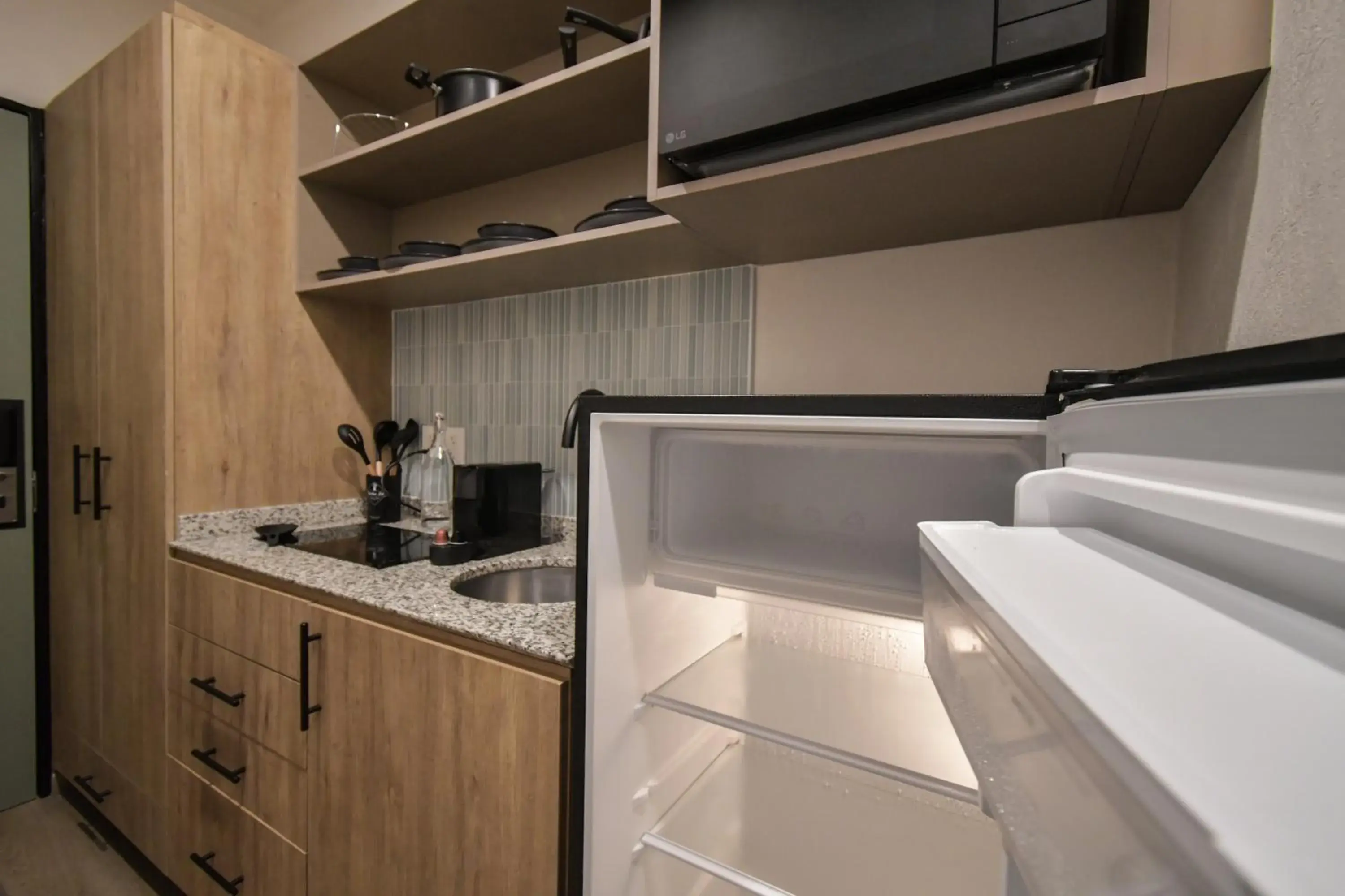kitchen in Expo Satelite 2750 Hotel & Suites kitchen in Expo Satelite 2750 Hotel & Suites