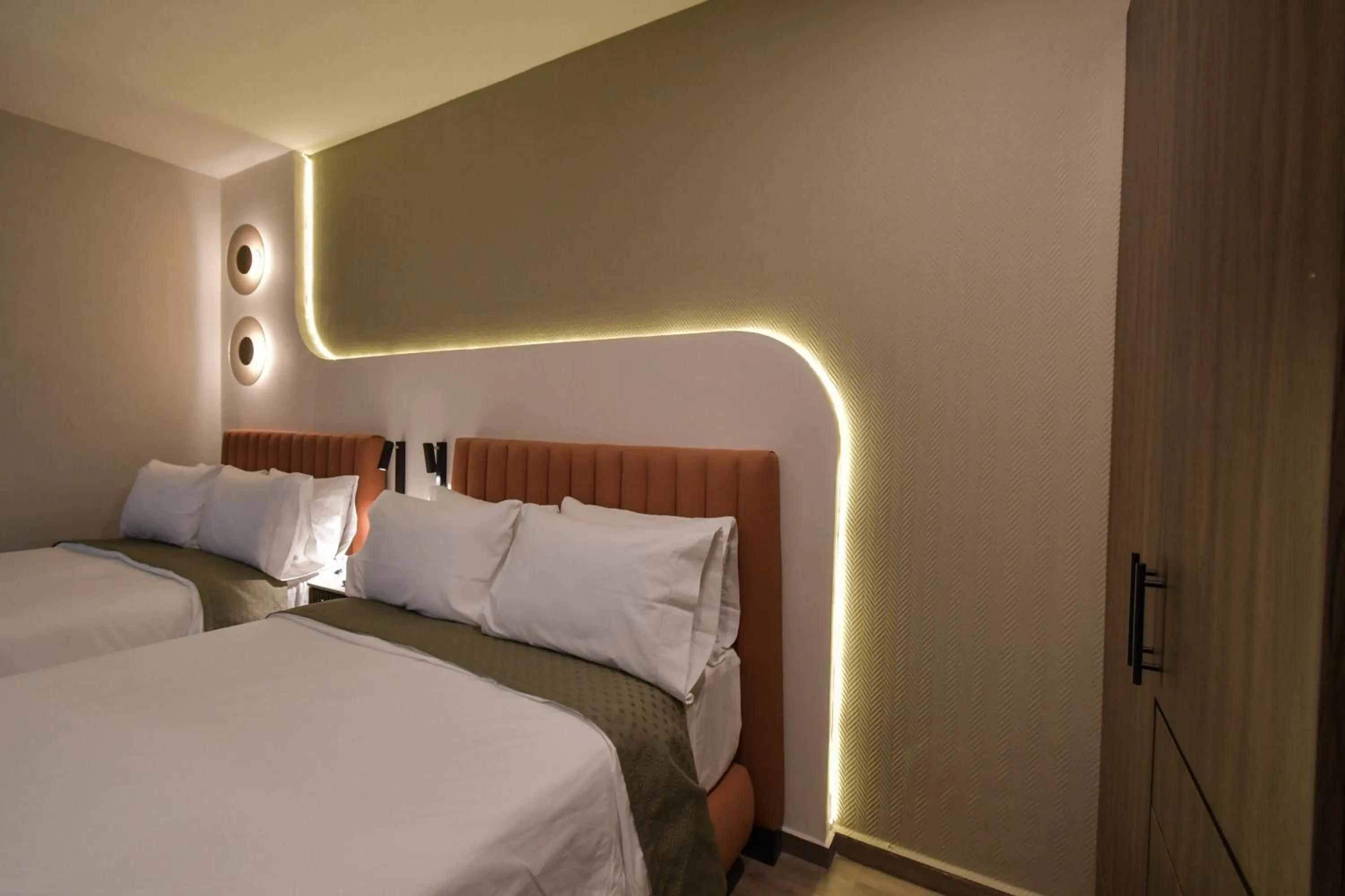 Bed in Expo Satelite 2750 Hotel & Suites