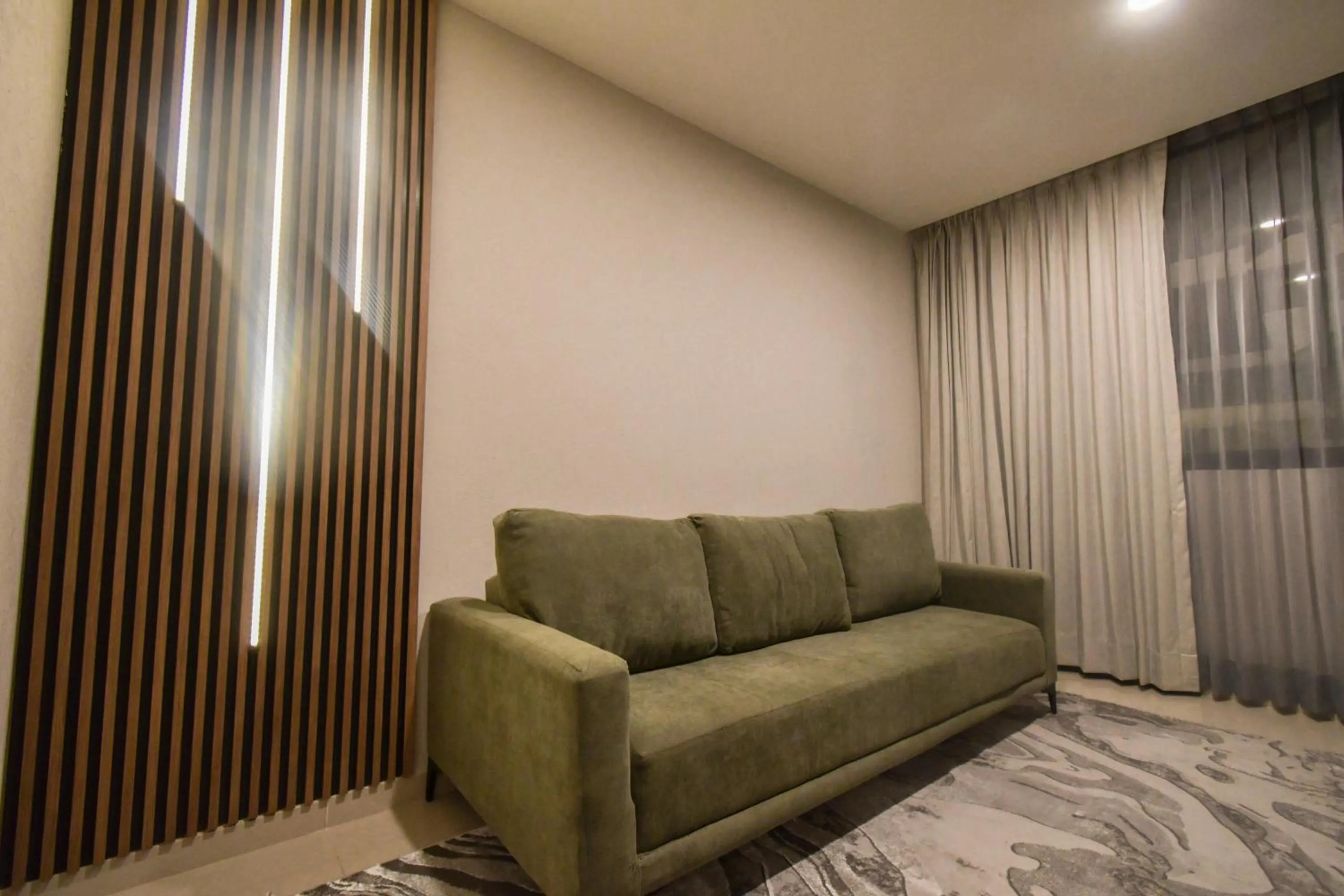 Living room in Expo Satelite 2750 Hotel & Suites