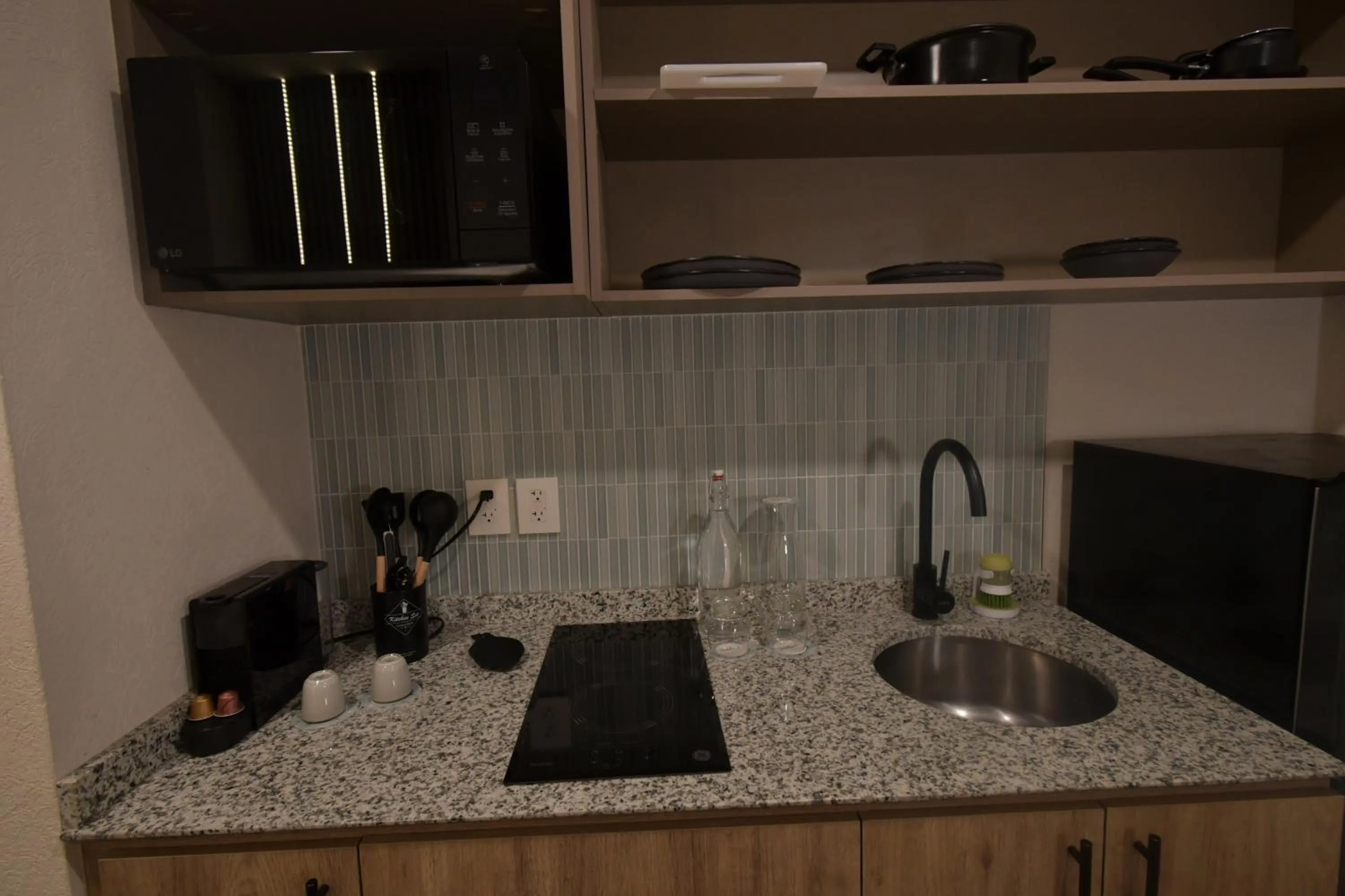 kitchen in Expo Satelite 2750 Hotel & Suites