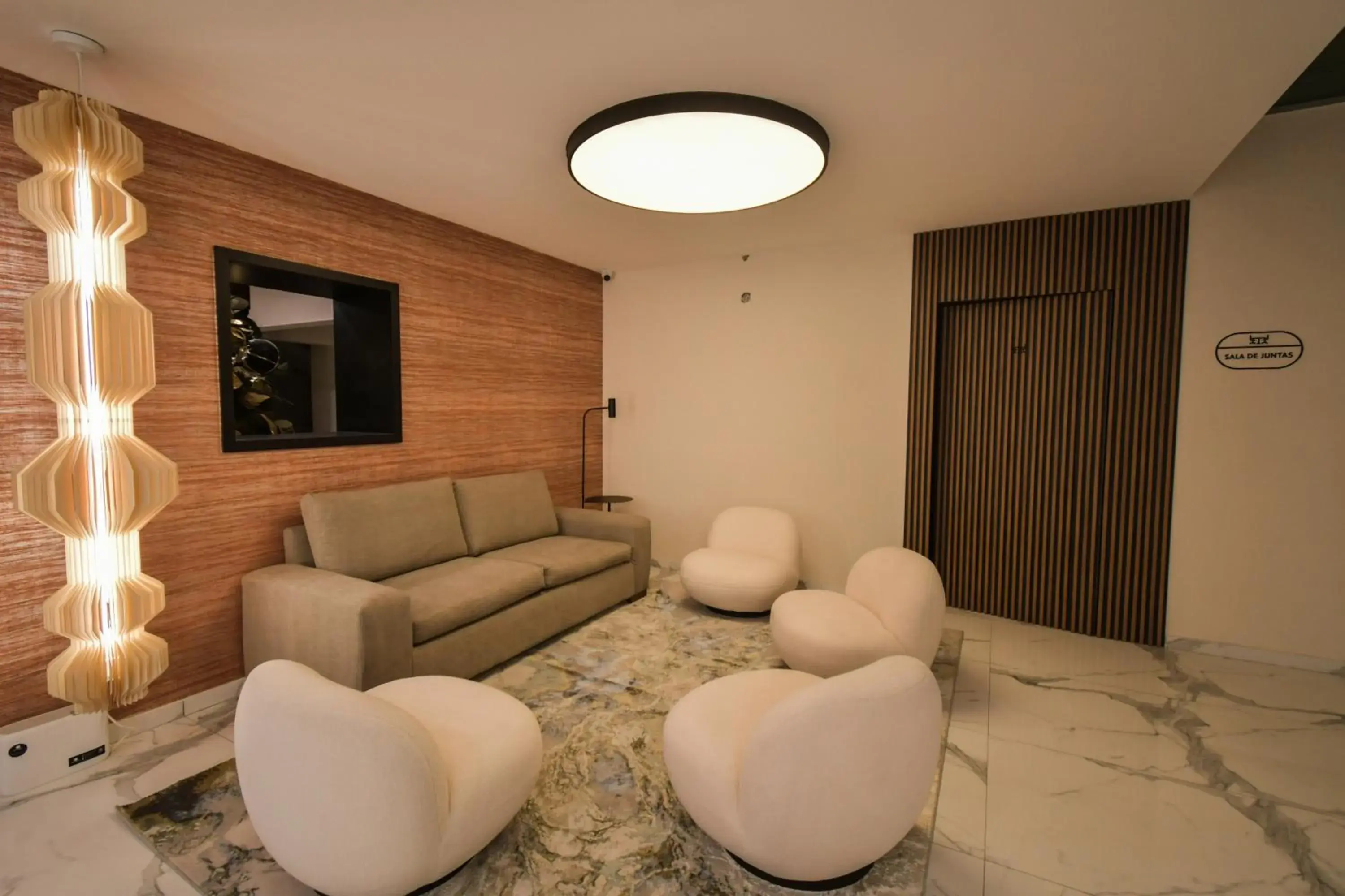 Living room in Expo Satelite 2750 Hotel & Suites Living room in Expo Satelite 2750 Hotel & Suites