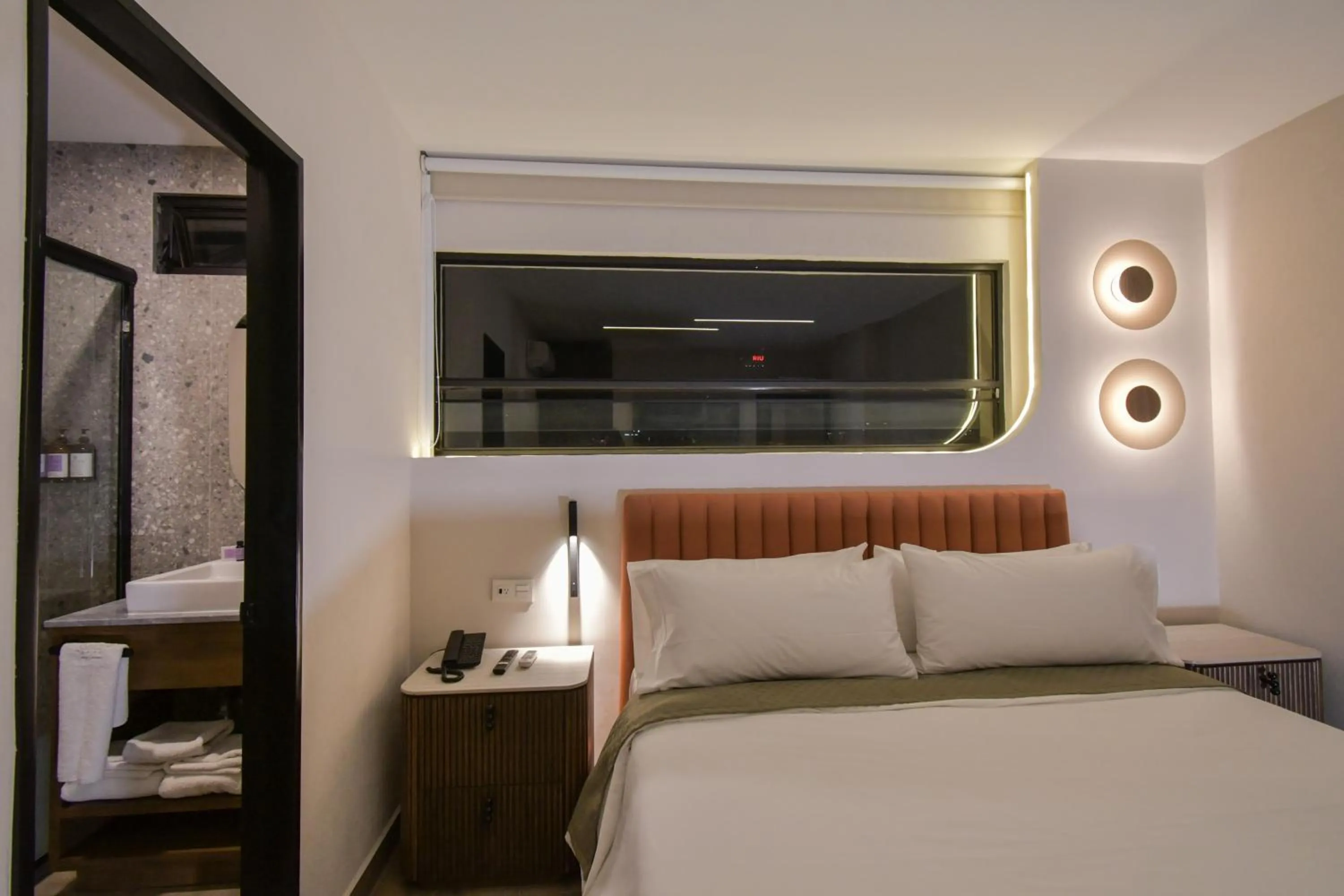 Bed in Expo Satelite 2750 Hotel & Suites