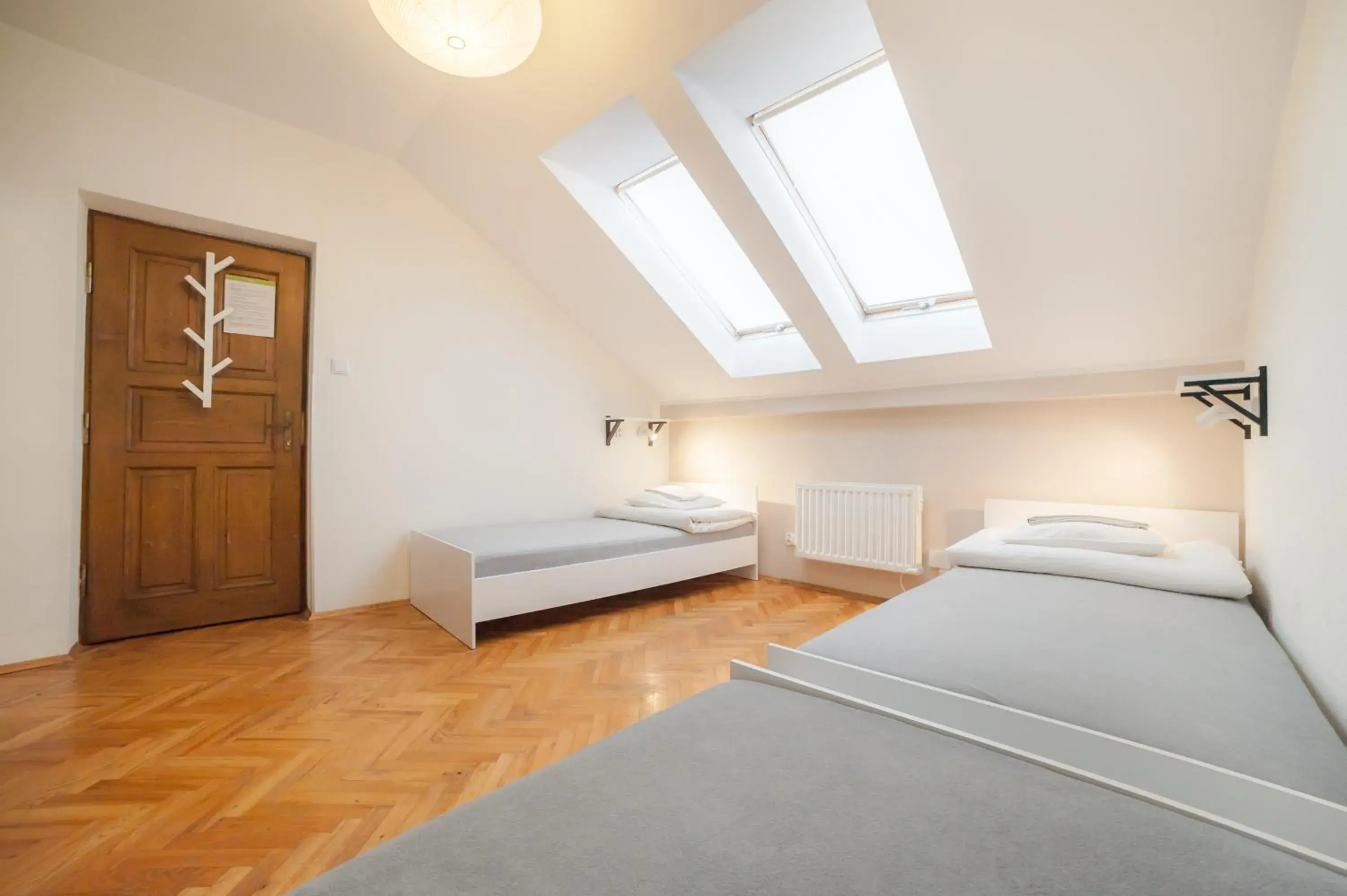 Triple Room with Shared Bathroom in Dizzy Daisy Hostel Triple Room with Shared Bathroom in Dizzy Daisy Hostel