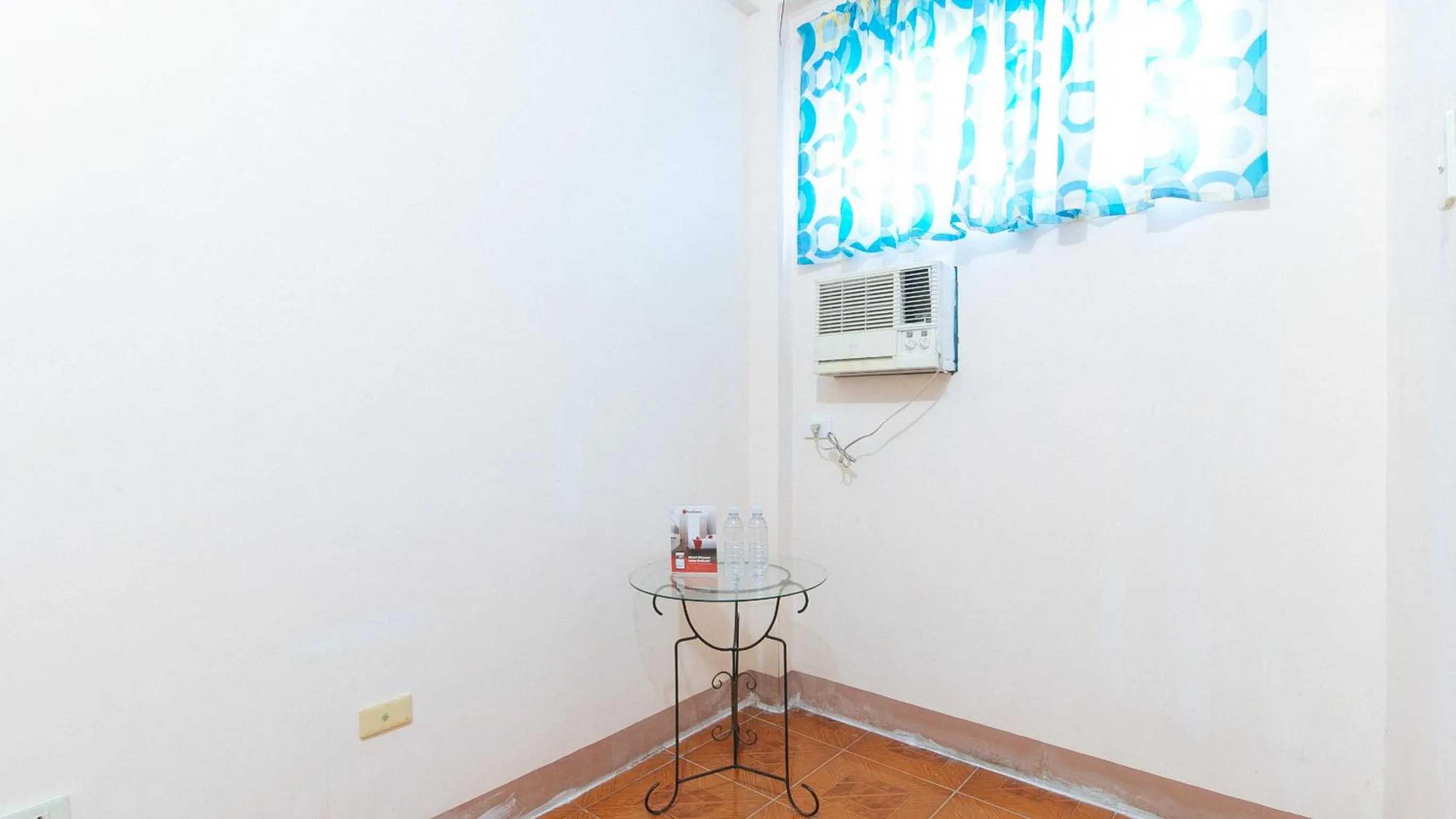 air conditioner in RedDoorz @ Goldland Spring Resort Urdaneta City