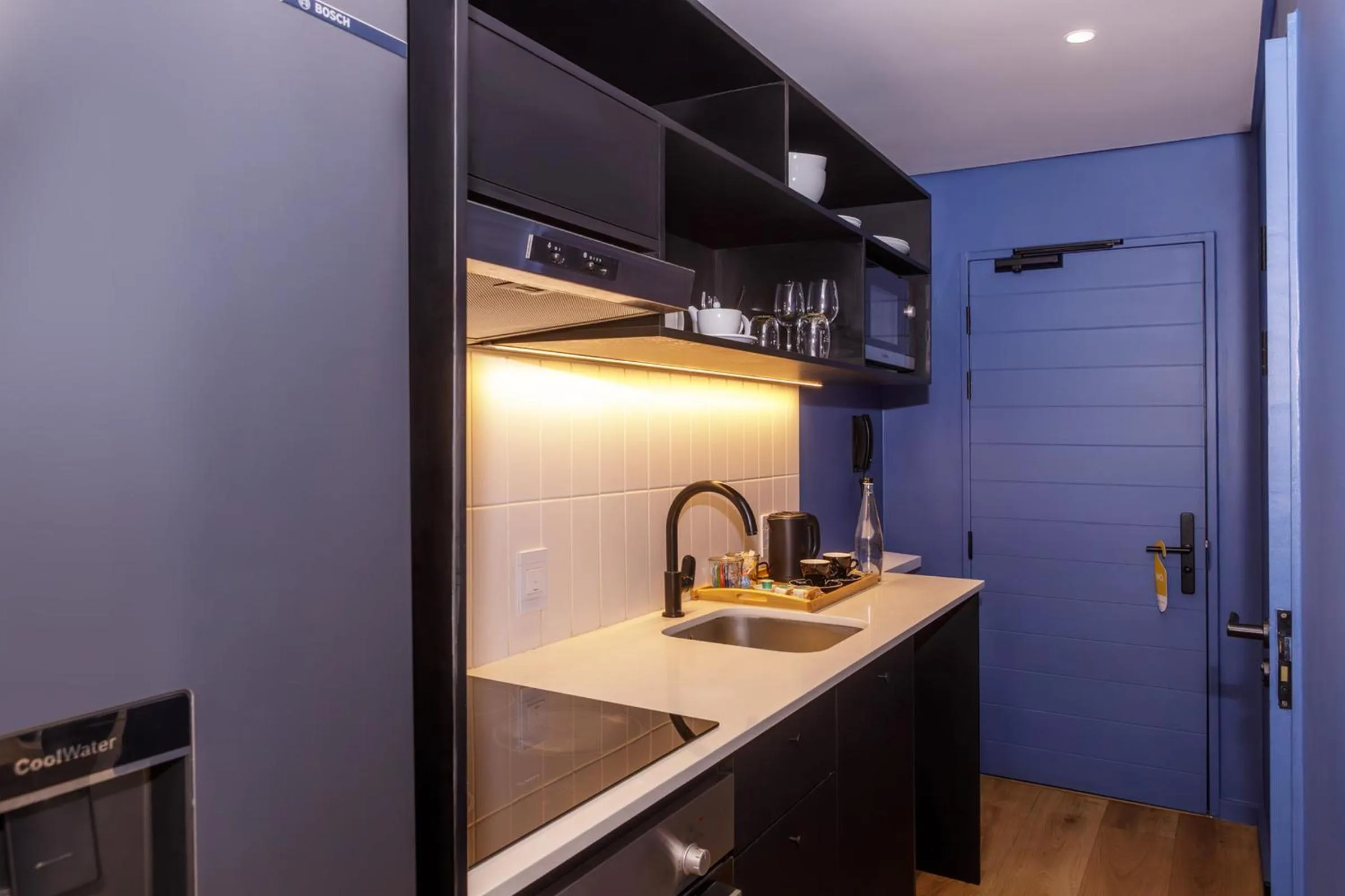 Kitchen or kitchenette in Home Suite Hotels Station House