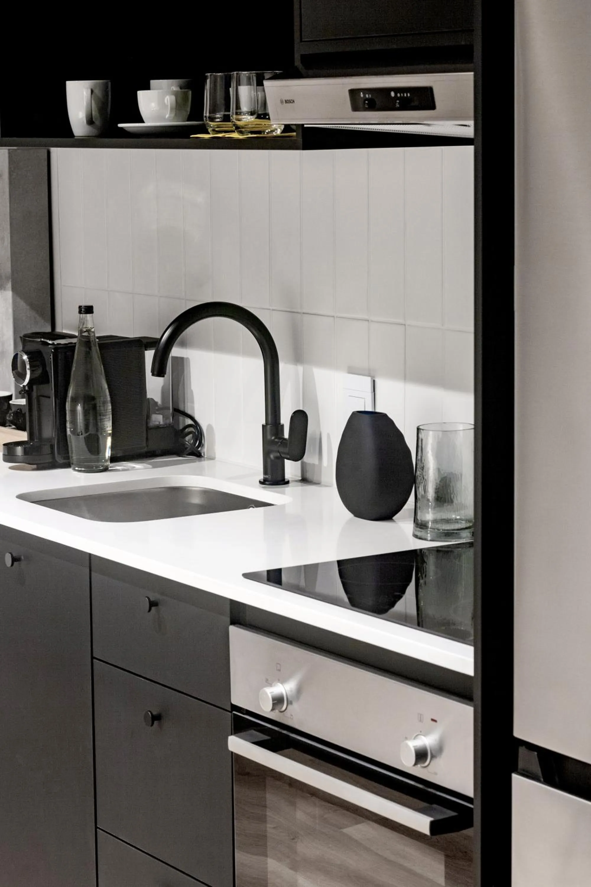 Kitchen or kitchenette in Home Suite Hotels Station House