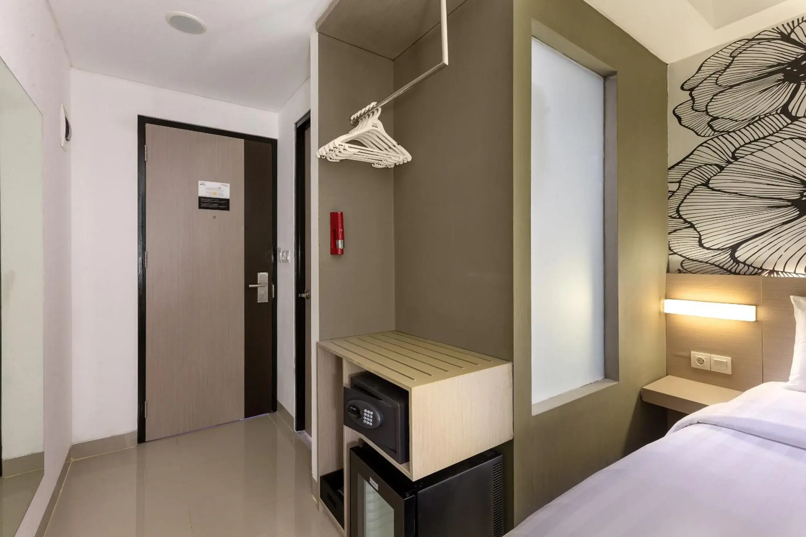 wardrobe, Bed in Hotel Neo Gading Solo wardrobe, Bed in Hotel Neo Gading Solo