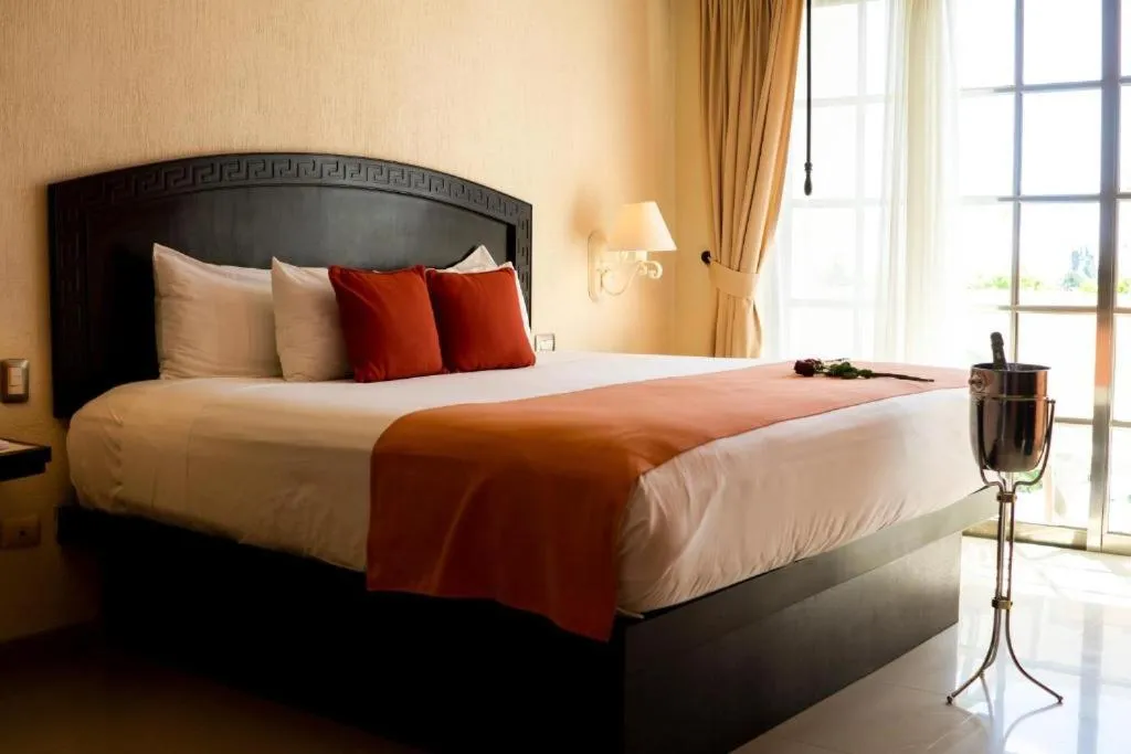 Double Room with Garden View in Posada Sian Kaan Playa del Carmen - Wellness Oriented Hotel