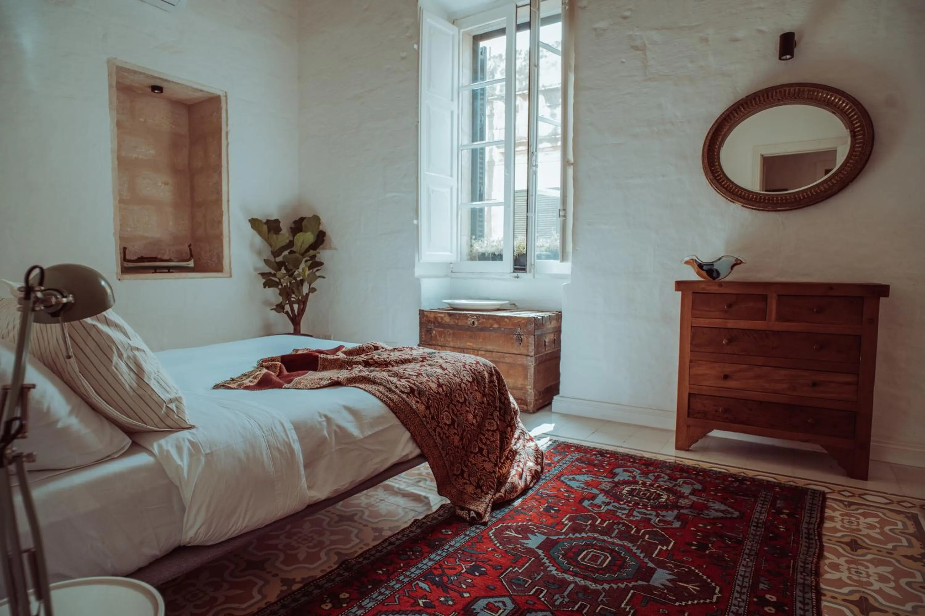 Bed in Santa Margerita Palazzino Apartment