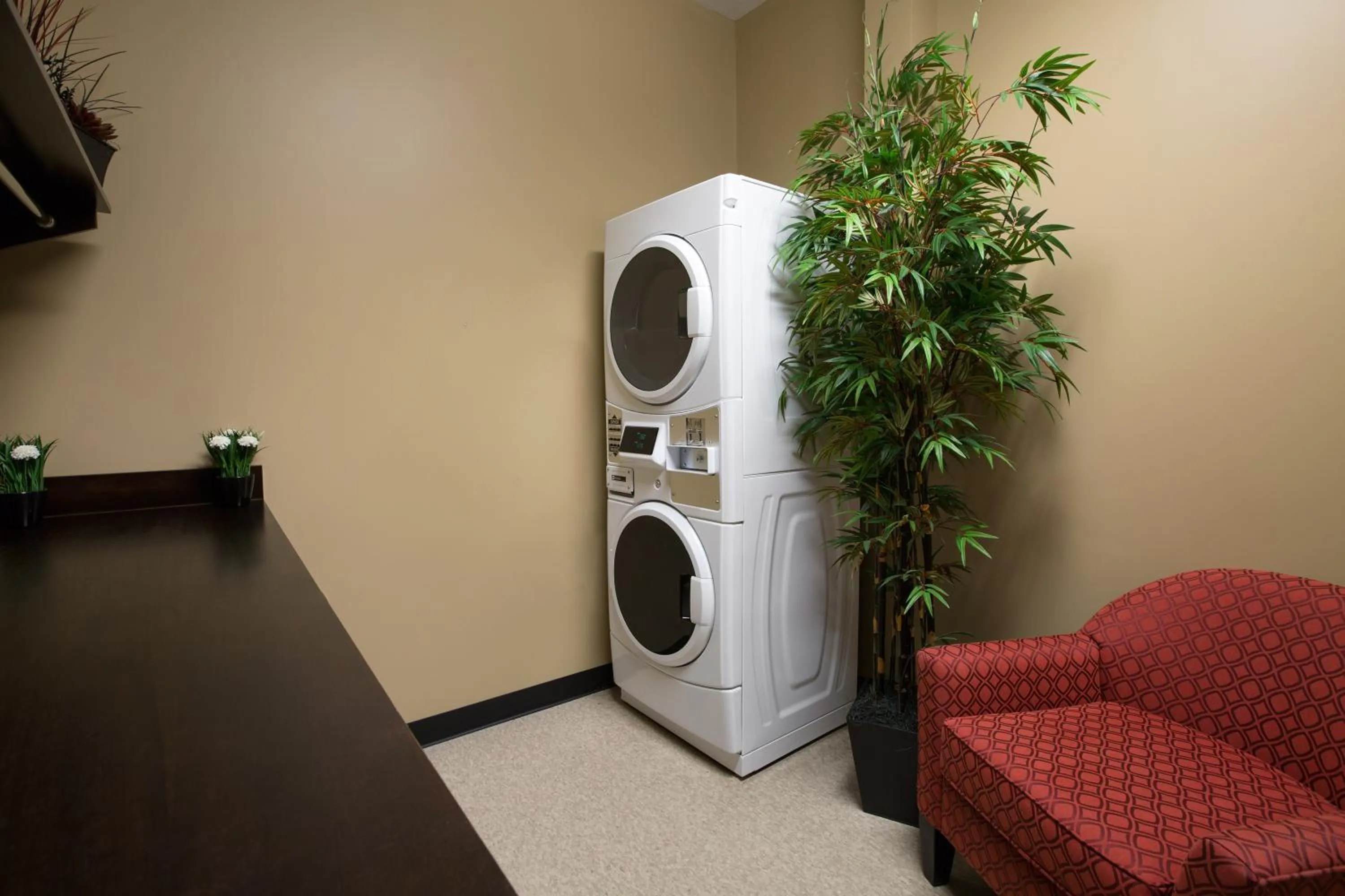 washing machine in Microtel Inn and Suites by Wyndham Weyburn