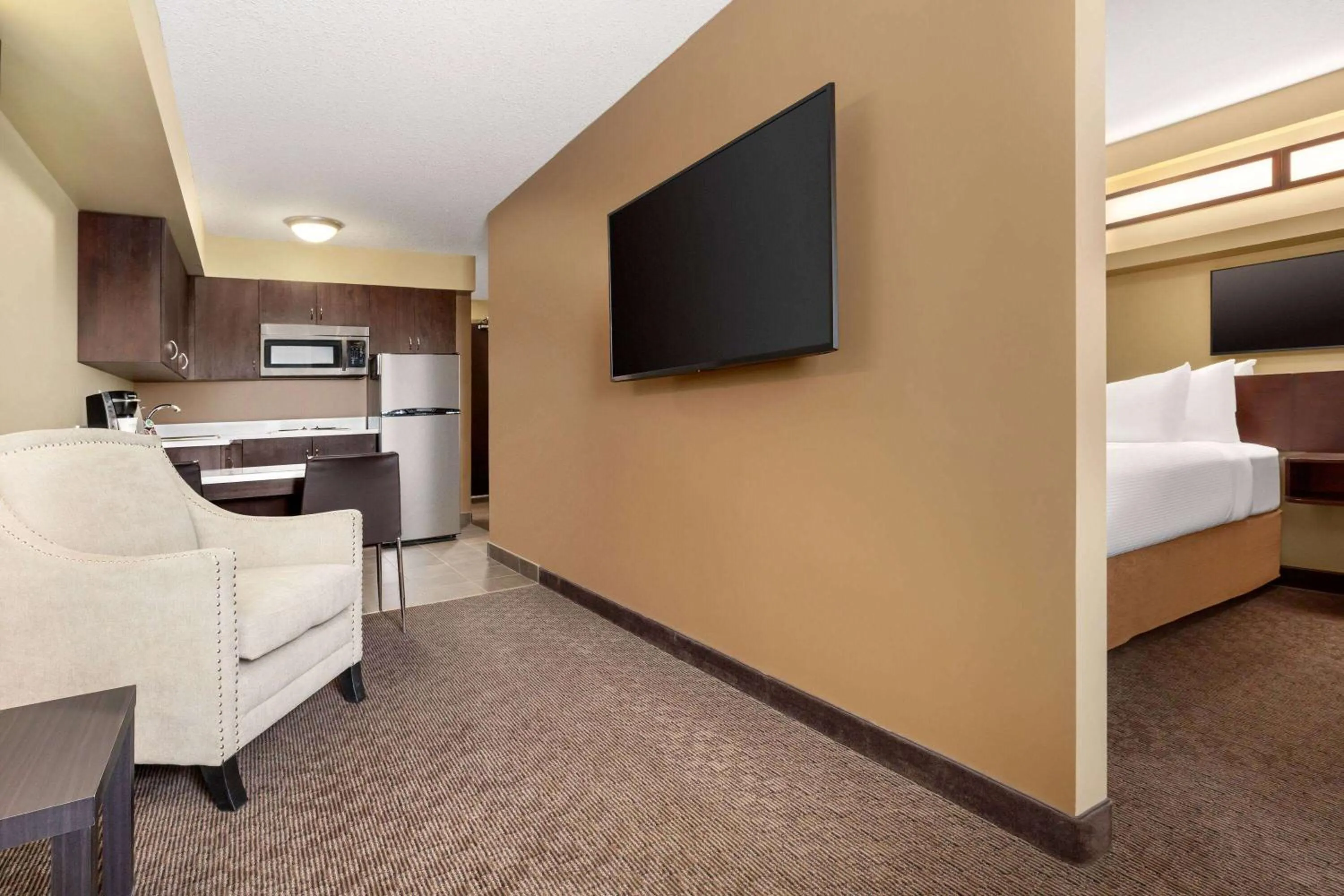 Bed in Microtel Inn and Suites by Wyndham Weyburn