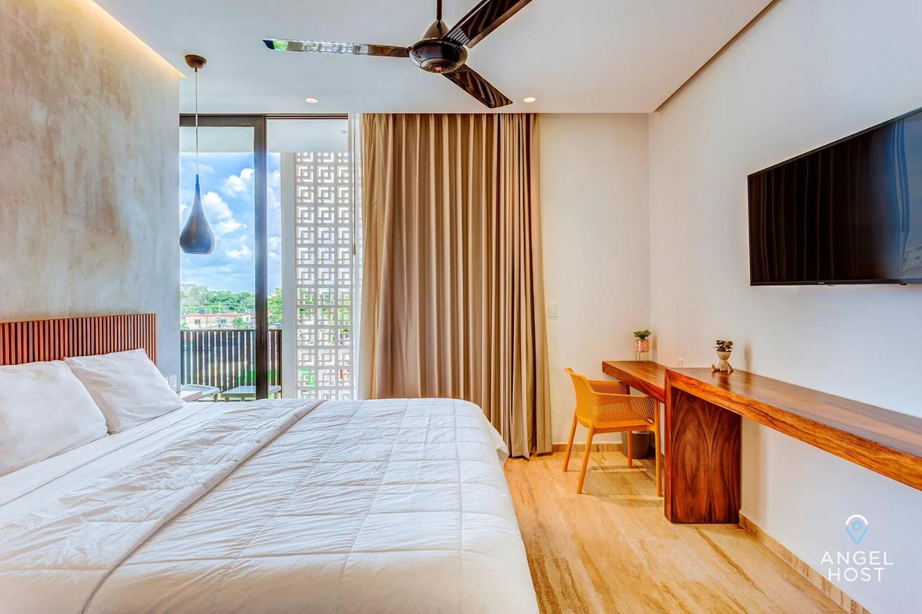 Photo of the whole room, Bed in Chic Condotel with Roof Pool 10-Min Walk to Beach