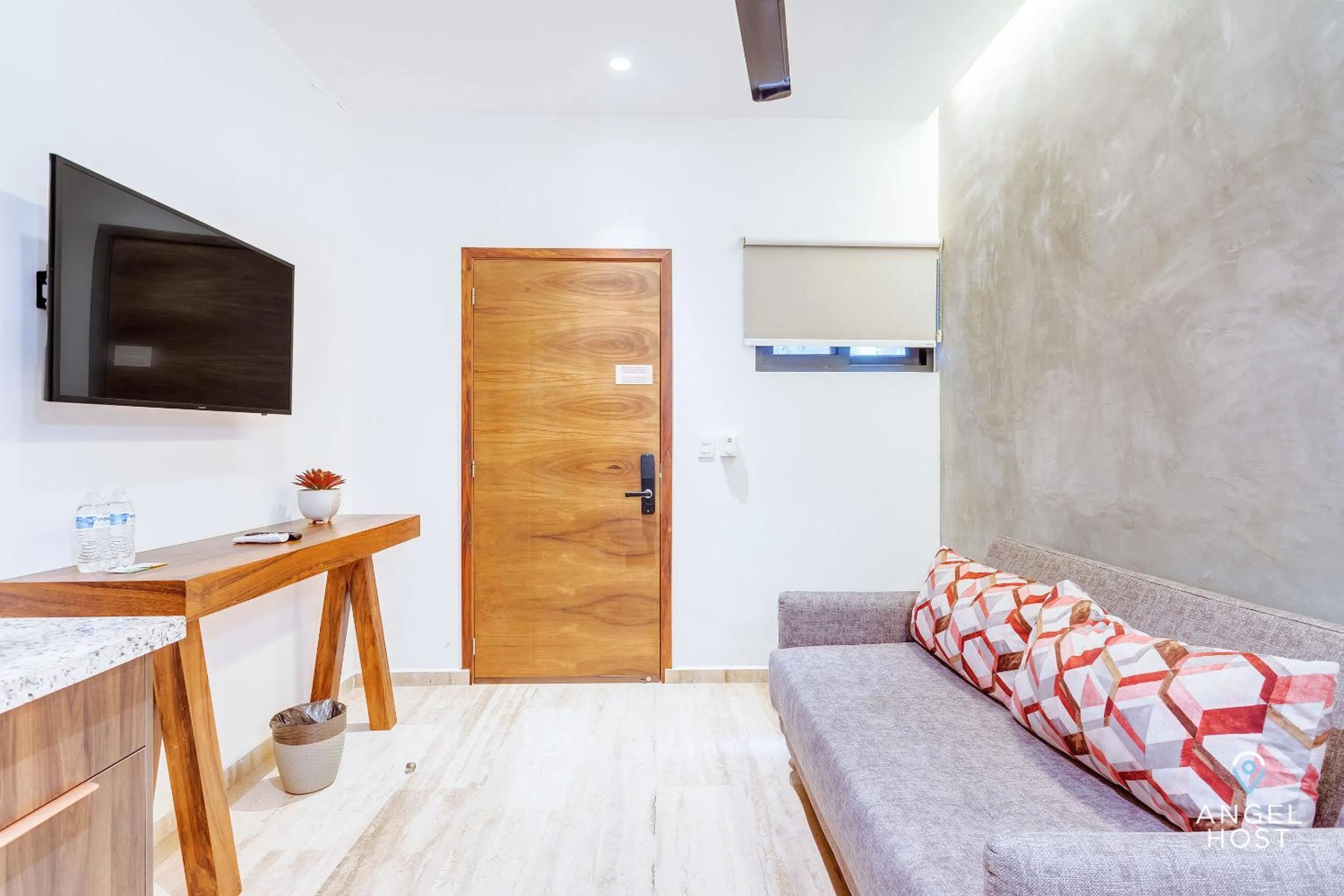 Living room in Chic Condotel with Roof Pool 10-Min Walk to Beach