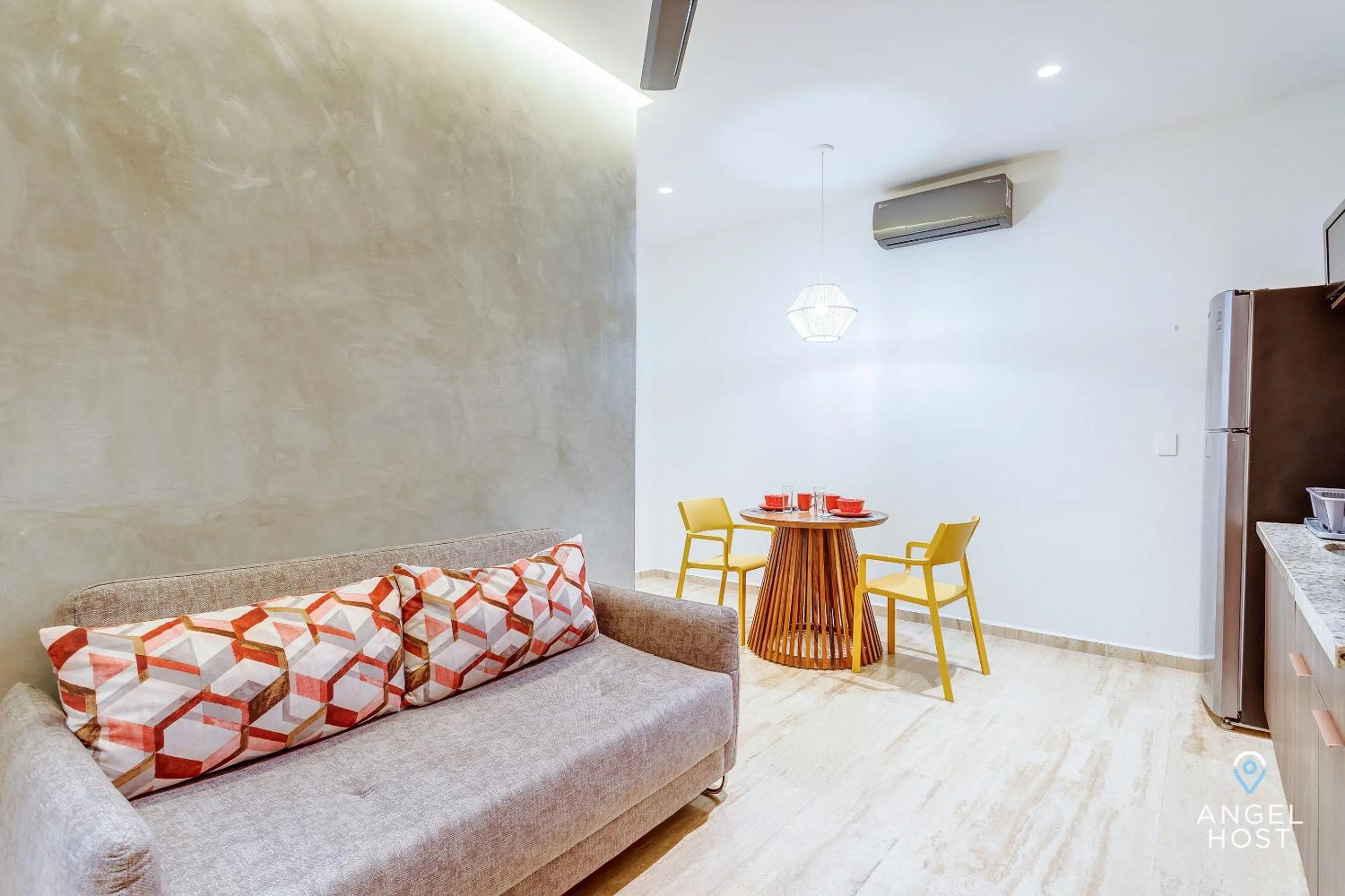 Living room in Chic Condotel with Roof Pool 10-Min Walk to Beach