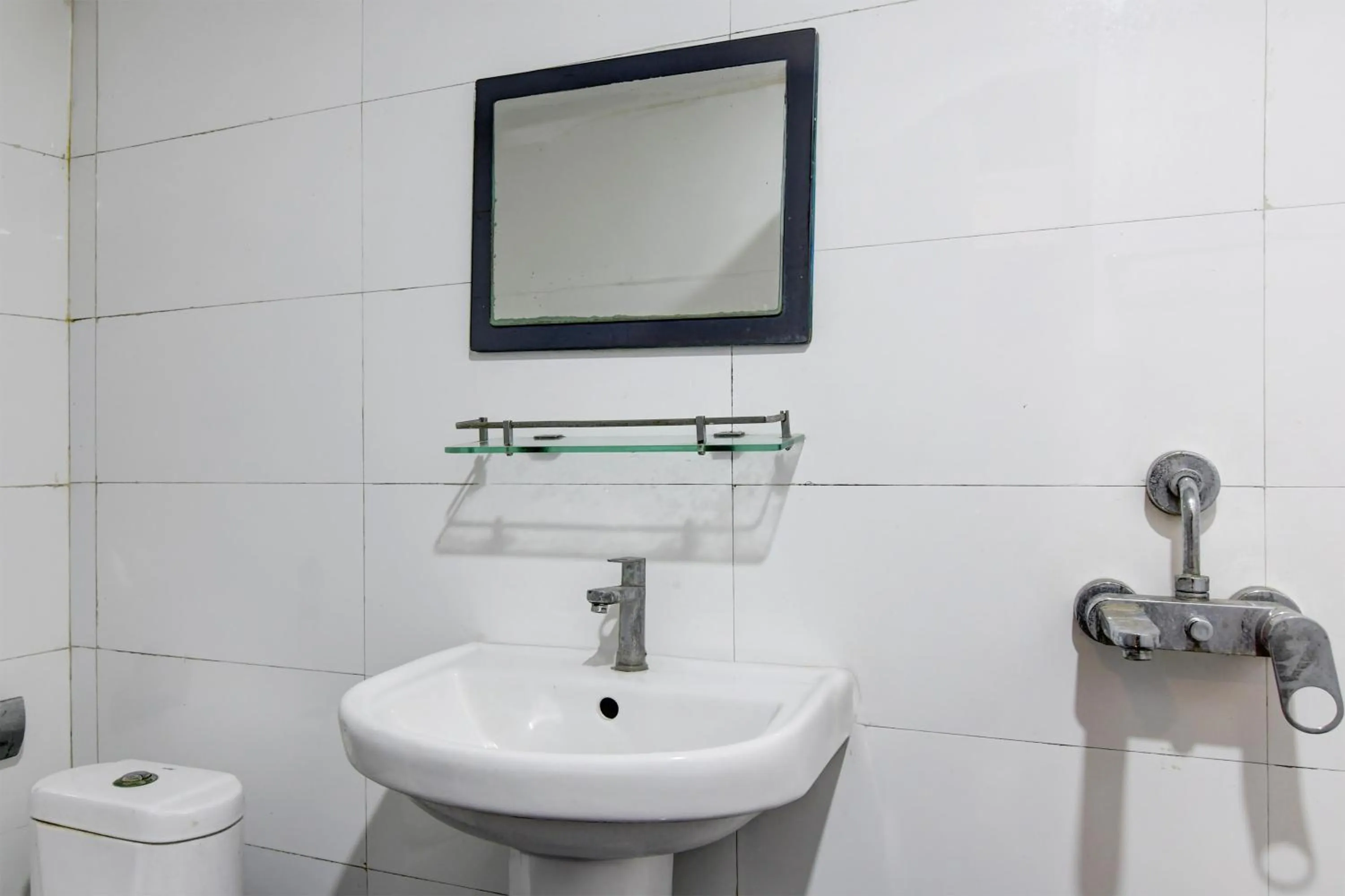 Bathroom in Super Collection O VIP Road Formerly Hotel Heritage