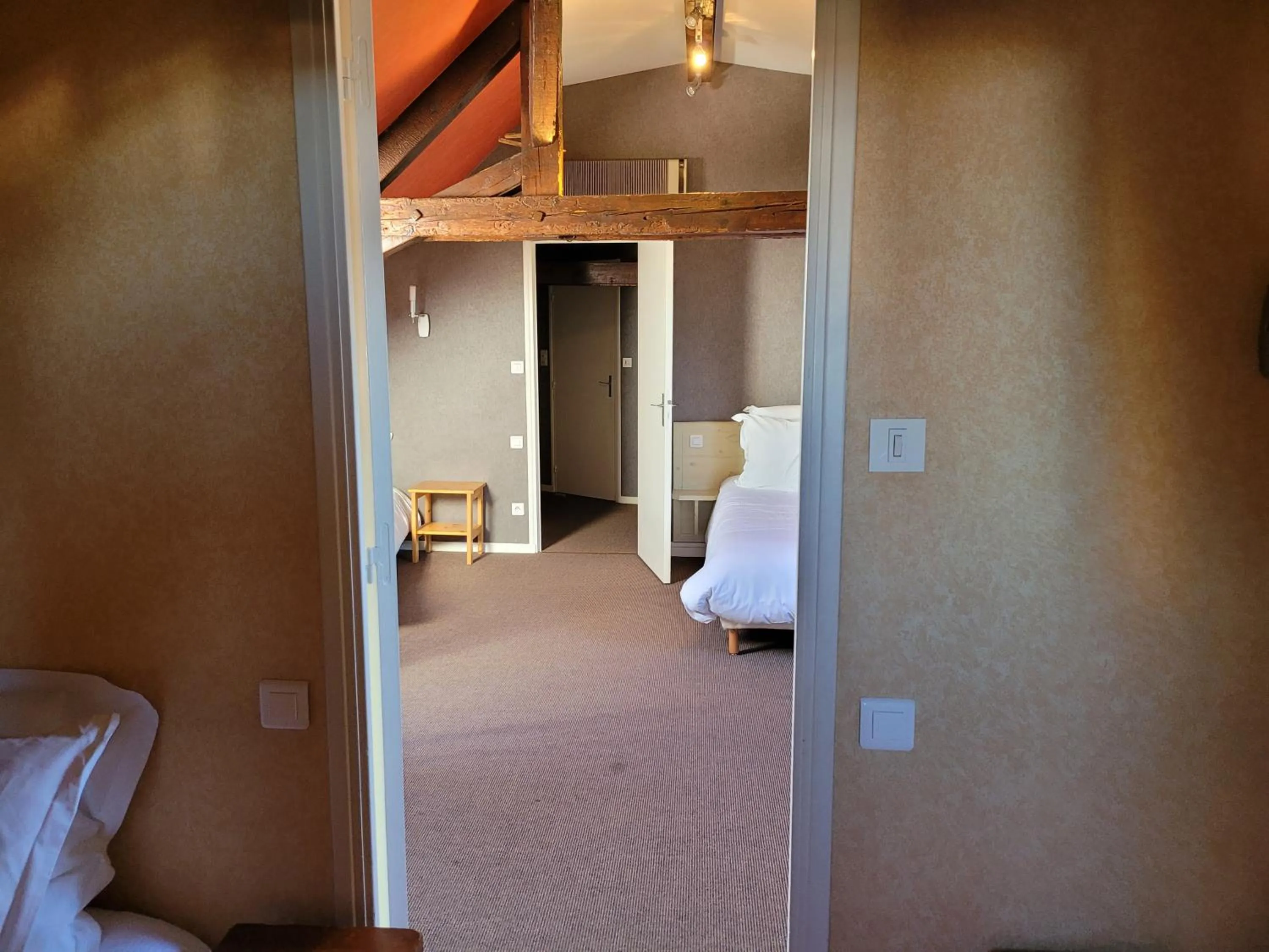 Bed in L'AUBERGE DE L'OLIVE