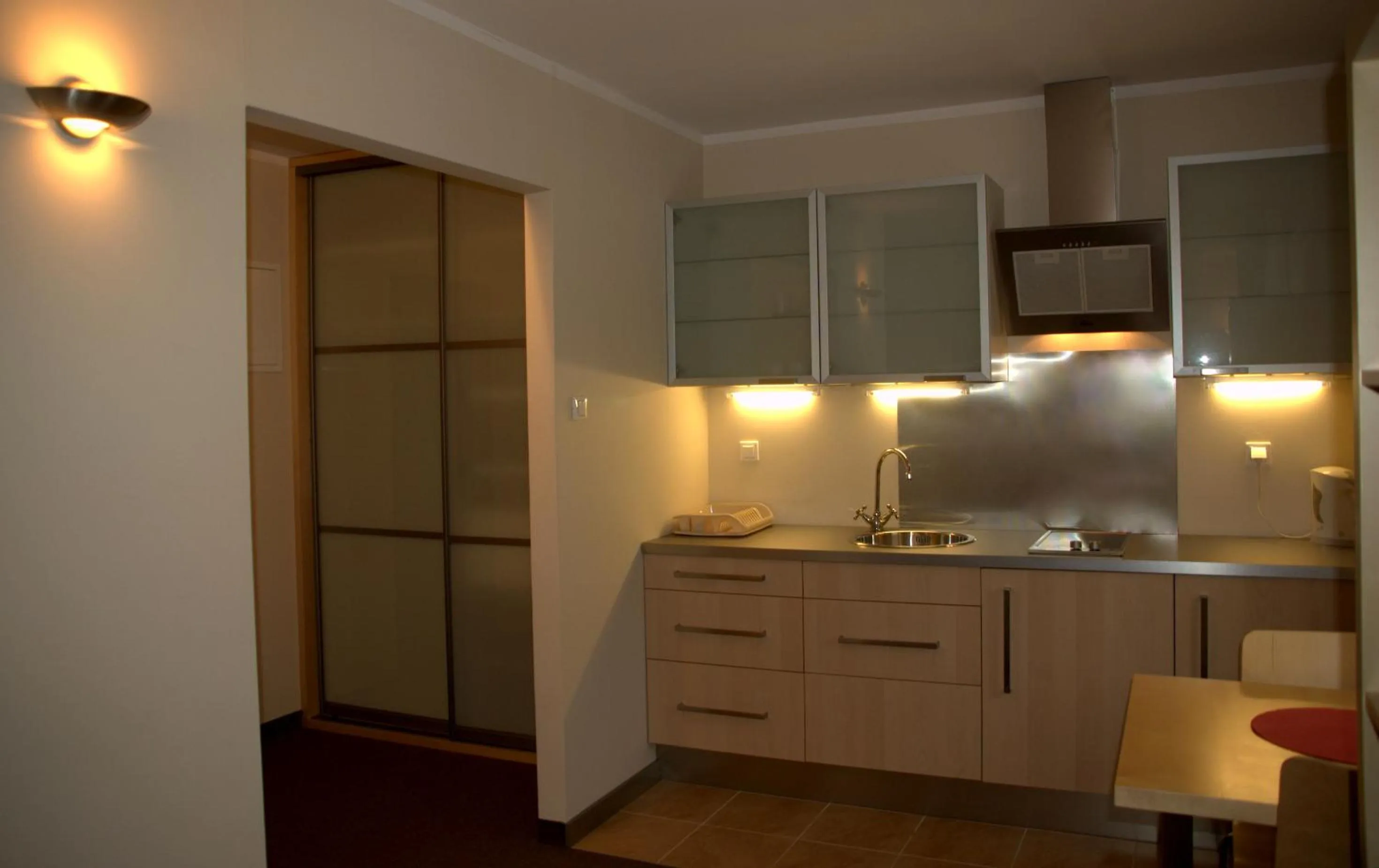 Kitchen or kitchenette in Warsaw Apartments Magnolie