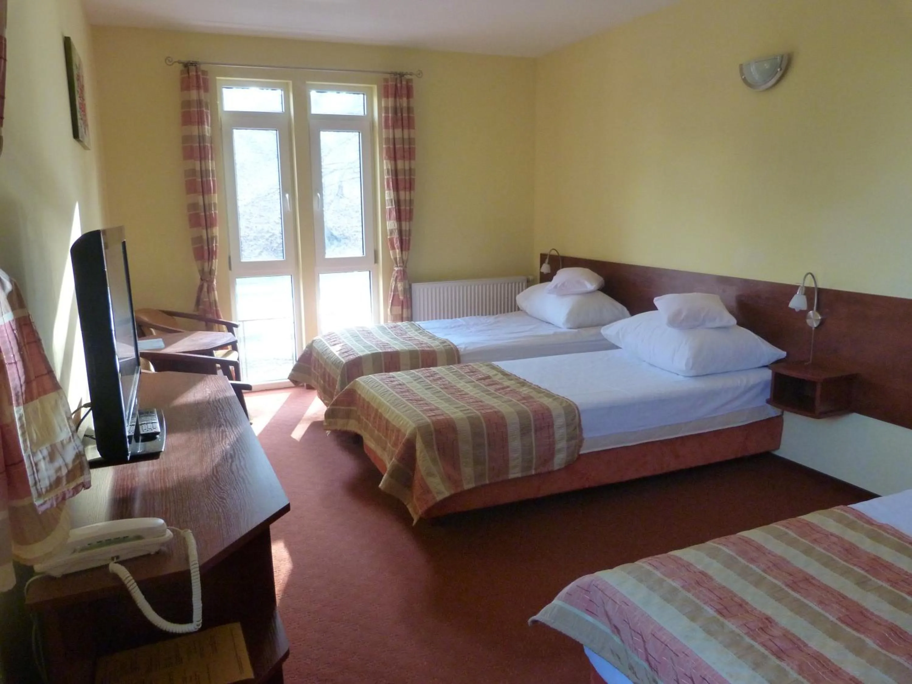 Bed in Hotel Kopernik