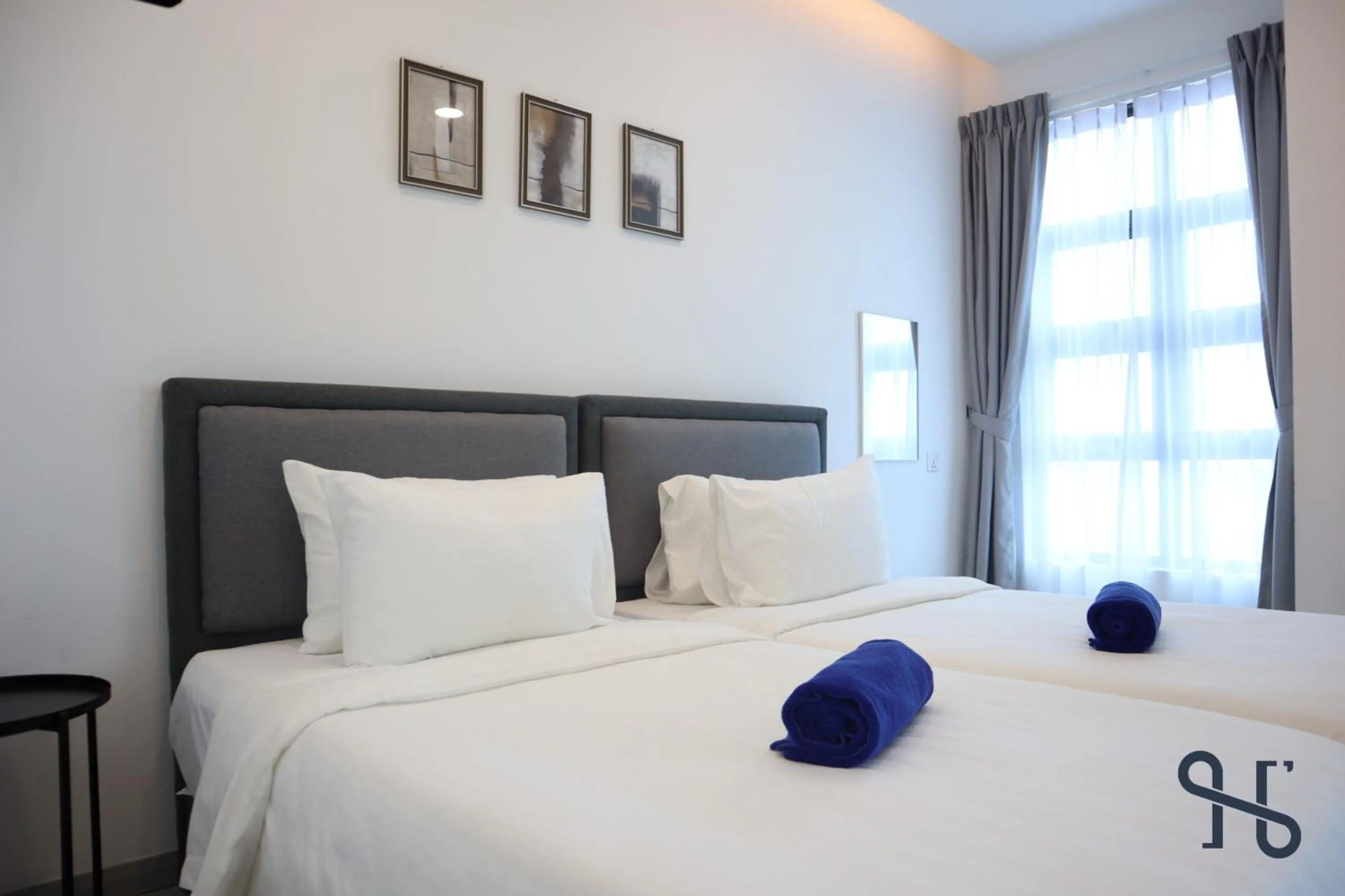 Bed in Homesuite' Home at Jesselton Quay
