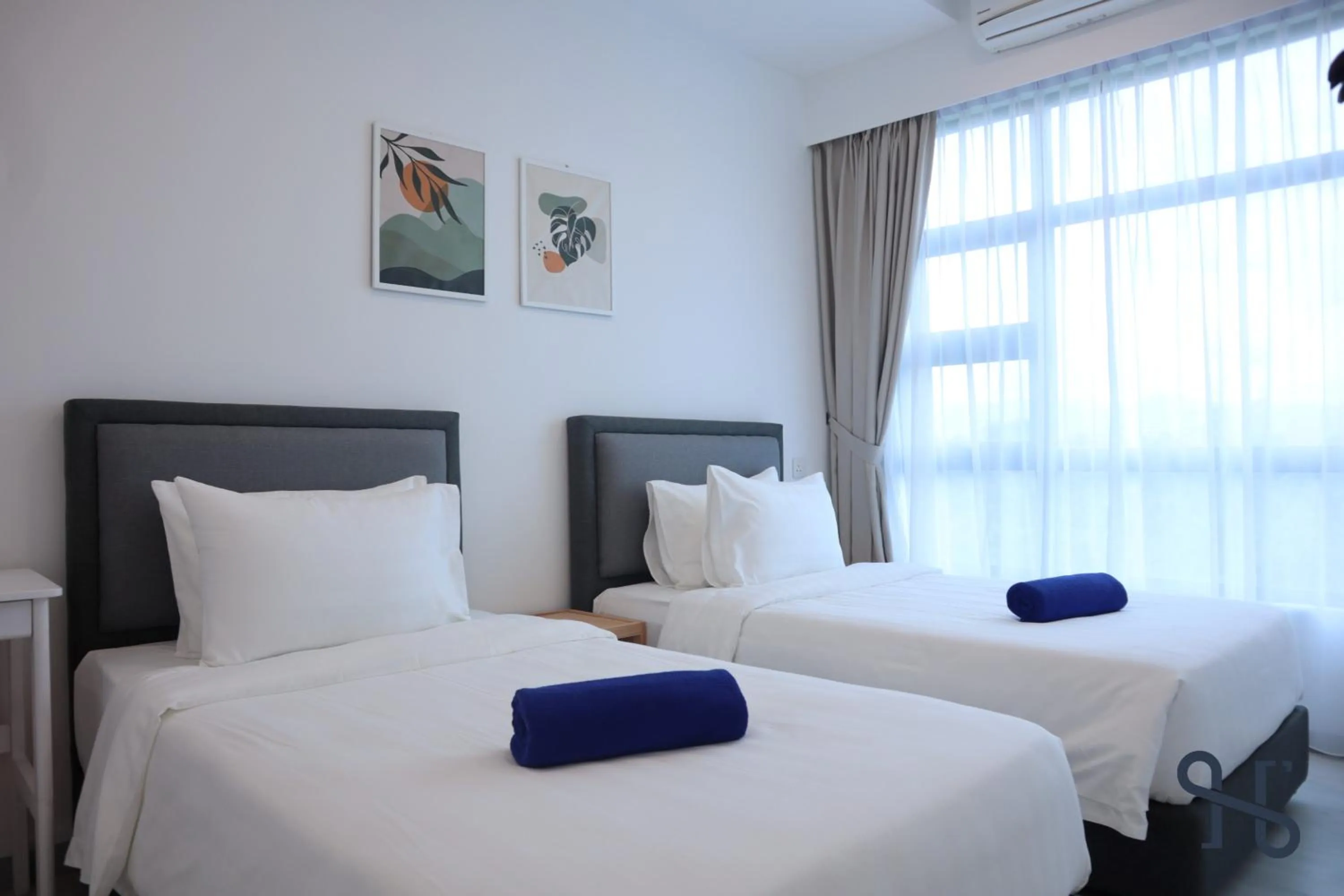 Bed in Homesuite' Home at Jesselton Quay