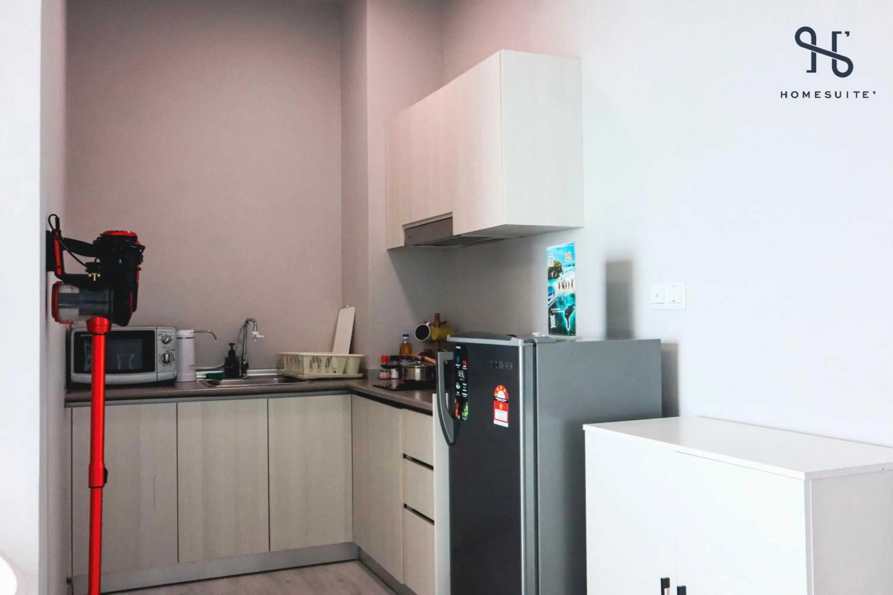 kitchen in Homesuite' Home at Jesselton Quay