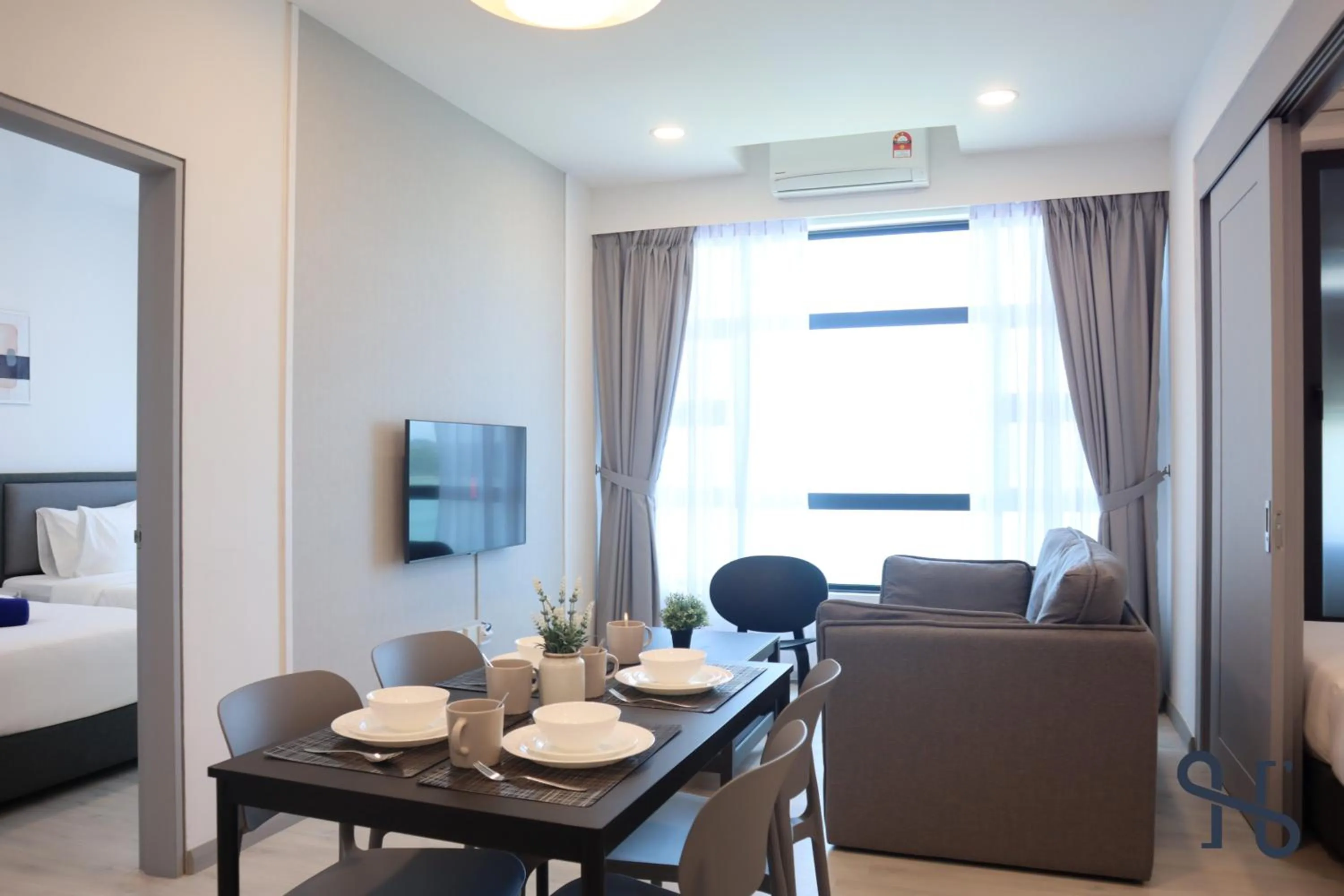 Bed in Homesuite' Home at Jesselton Quay