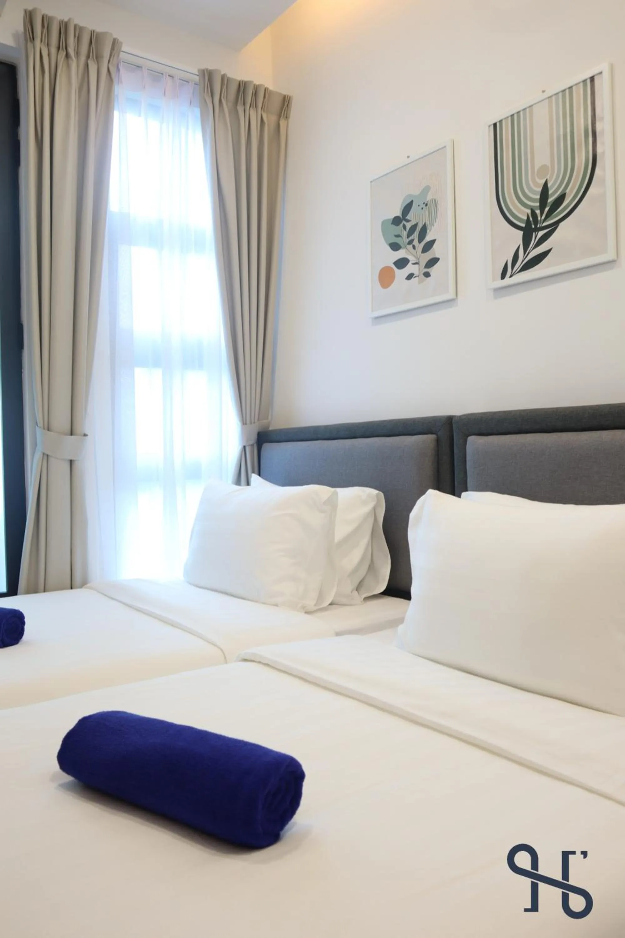 Bed in Homesuite' Home at Jesselton Quay