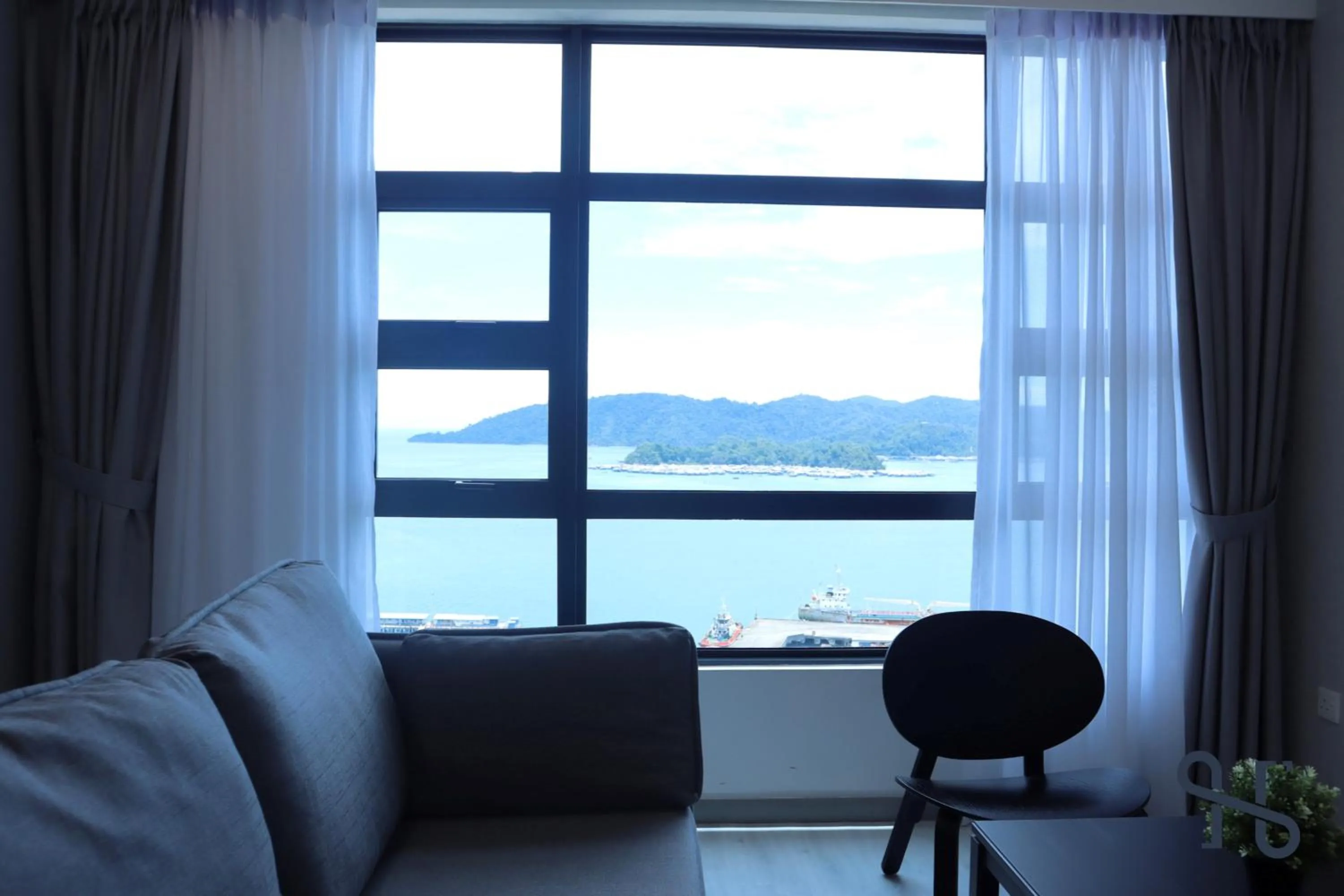 Living room in Homesuite' Home at Jesselton Quay