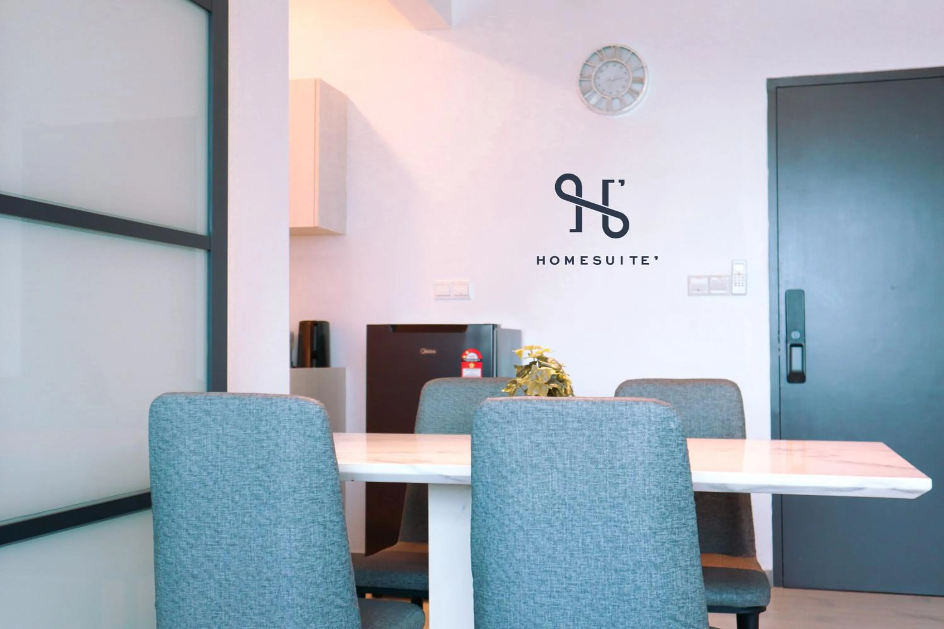 Dining area in Homesuite' Home at Jesselton Quay