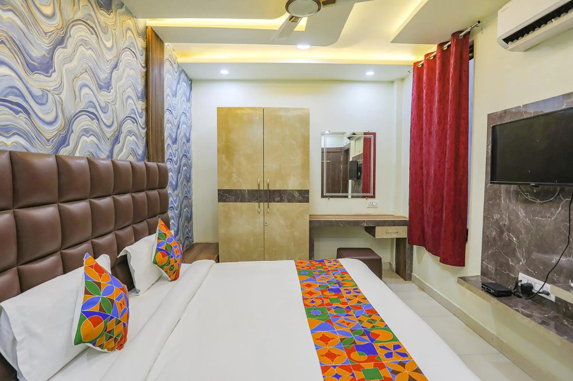 Bed in FabHotel Naman