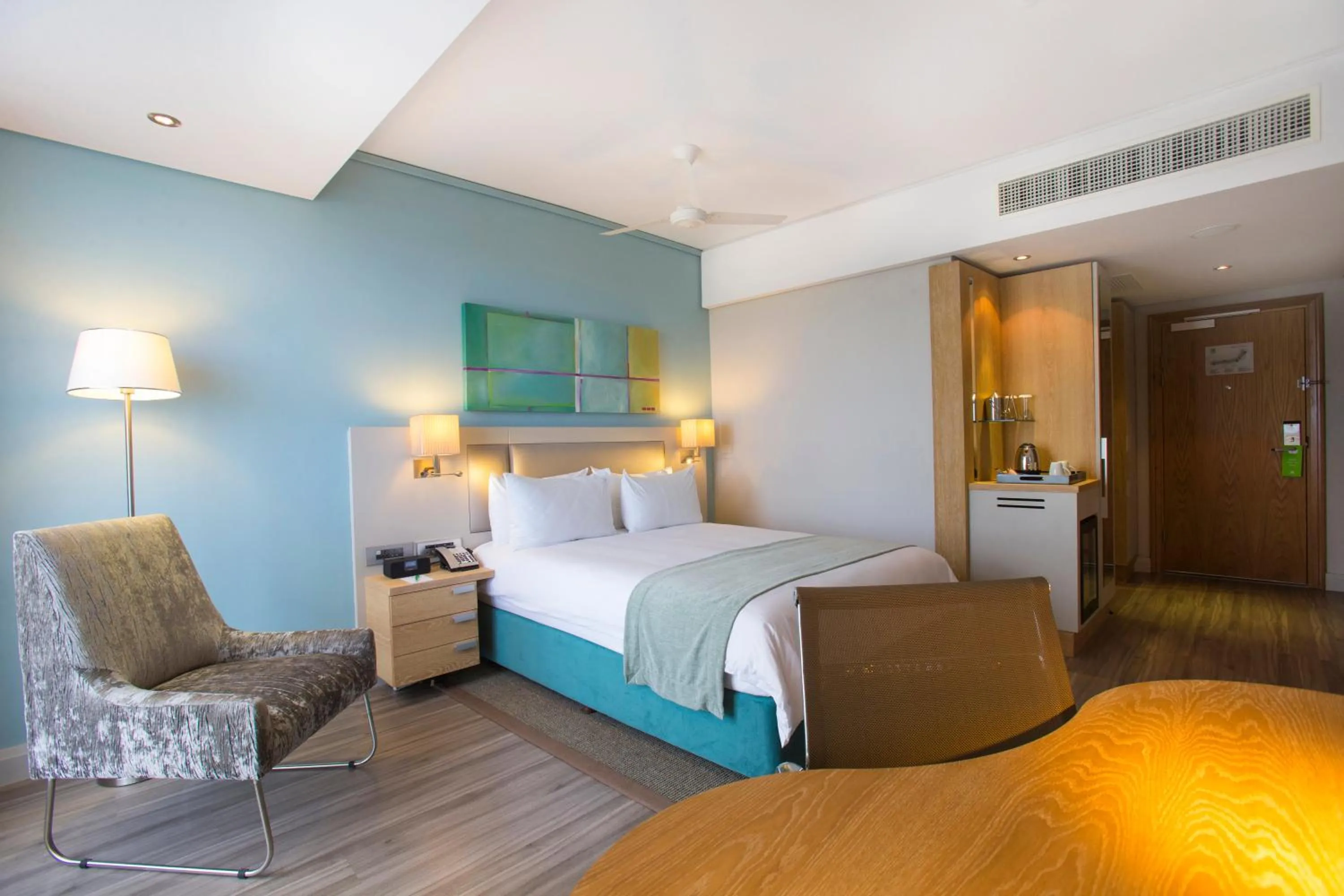 Photo of the whole room, Bed in Holiday Inn Mauritius Mon Trésor by IHG