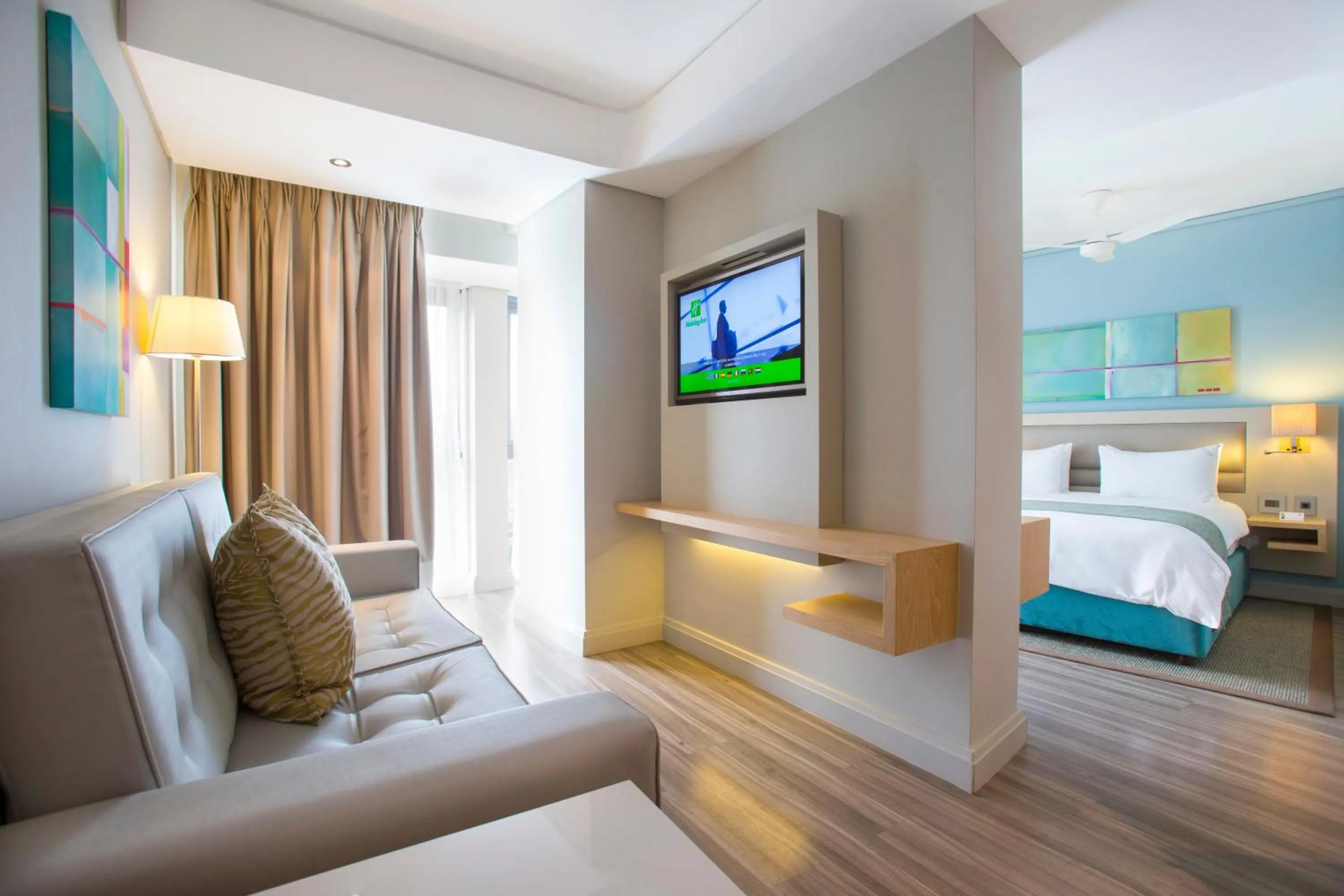 Seating area, Bed in Holiday Inn Mauritius Mon Trésor by IHG