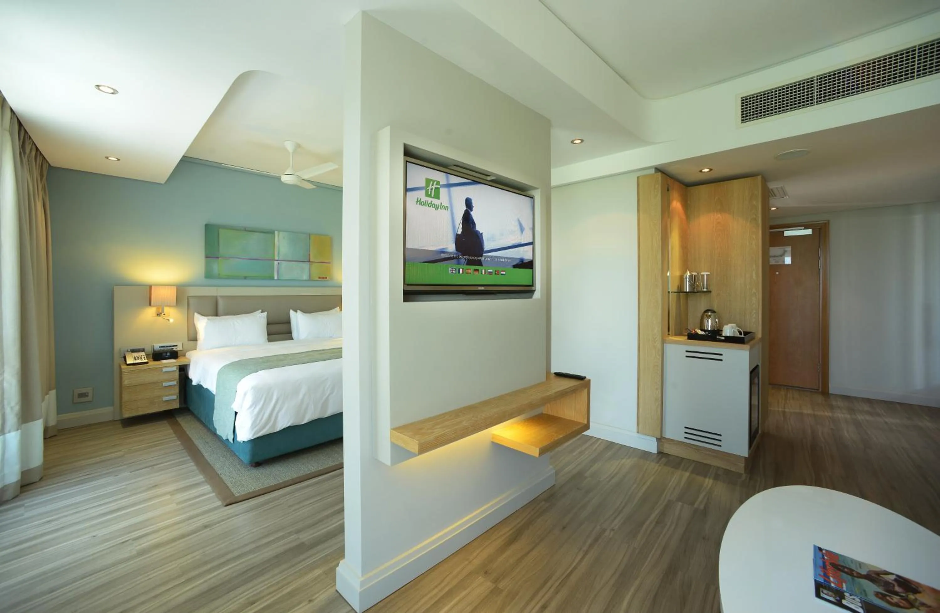 Photo of the whole room, Bed in Holiday Inn Mauritius Mon Trésor by IHG